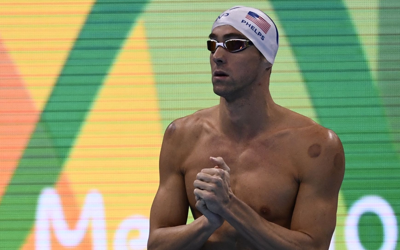 Le nageur américain Michael Phelps présente des ecchymoses sur son corps lors des Jeux olympiques de Rio en 2016 (AFP/Christophe Simon)