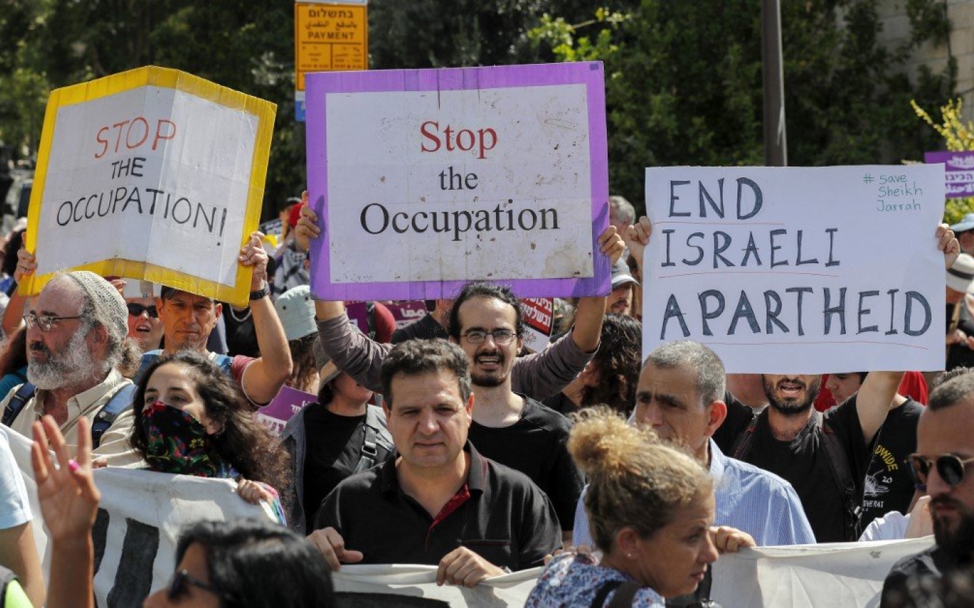 Des activistes manifestent contre l’occupation israélienne près de Sheikh Jarrah, le 11 juin 2021 (AFP)