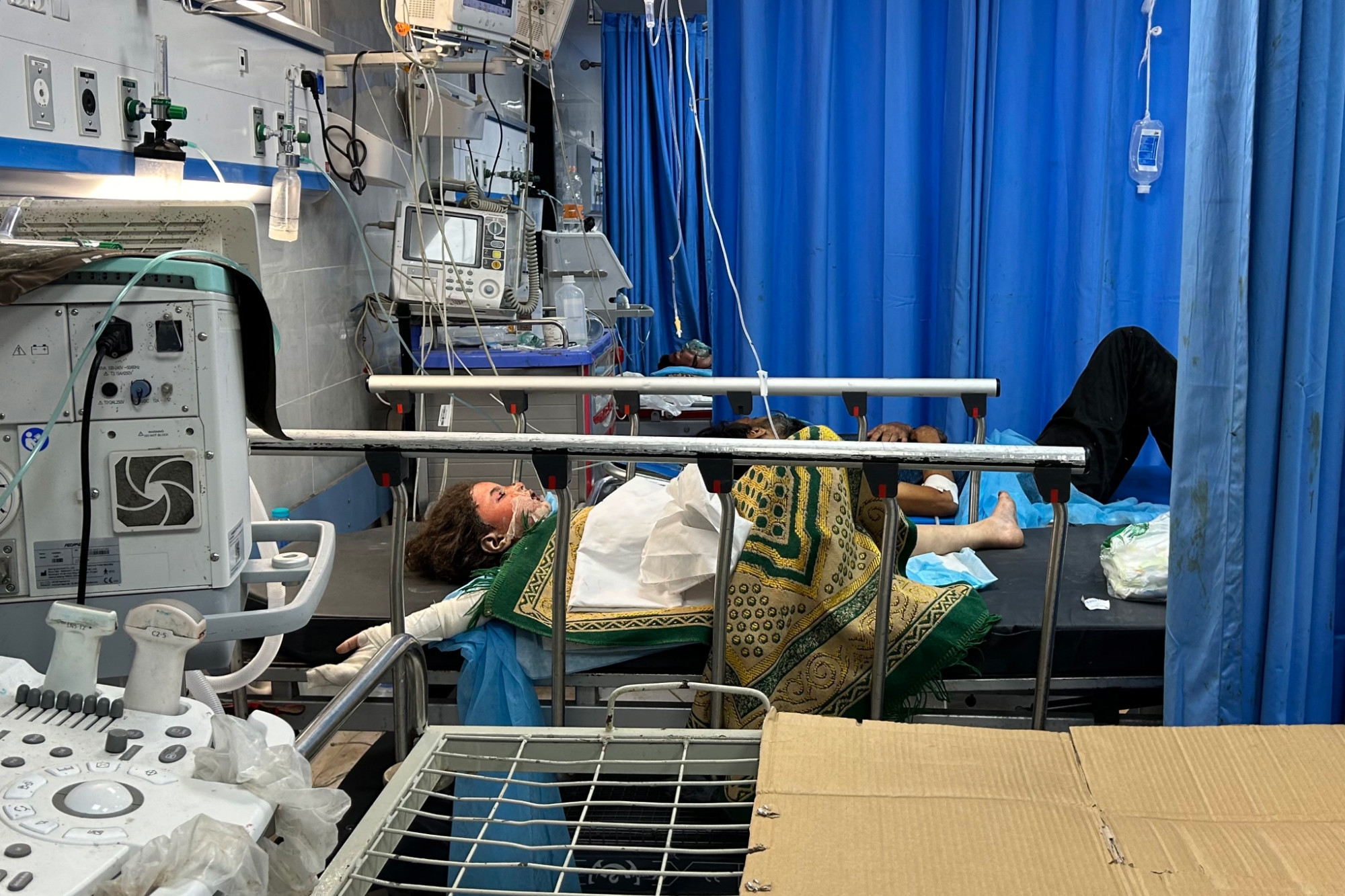 Patients receive treatment at Al-Shifa hospital in Gaza City on 10 November 2023 amid Israeli bombardment (AFP)