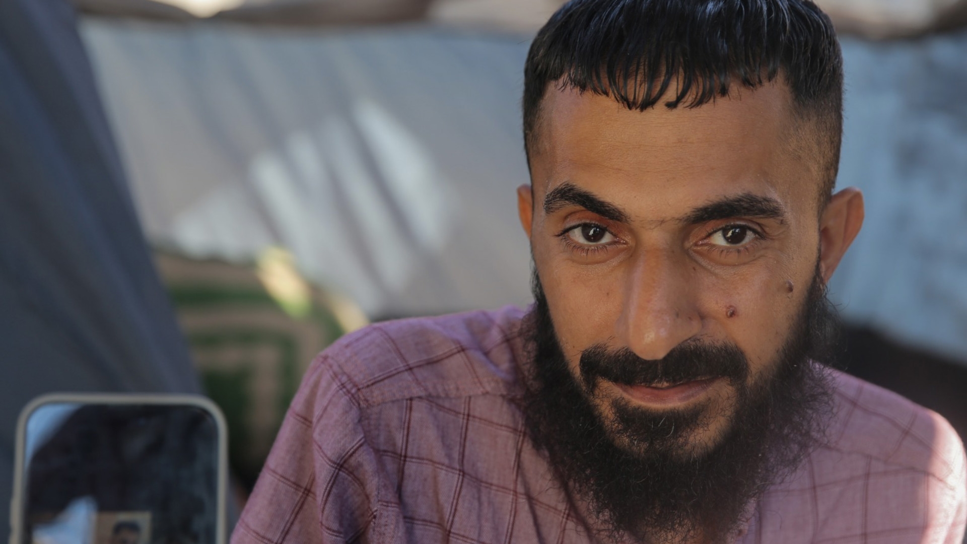 Ibrahim Salem tells Middle East Eye about the abuse, including rape and electrocutions he suffered at the Sde Teiman torture facility, after he was released on 1 August, 2024 (MEE/Mohammed al-Hajjar)