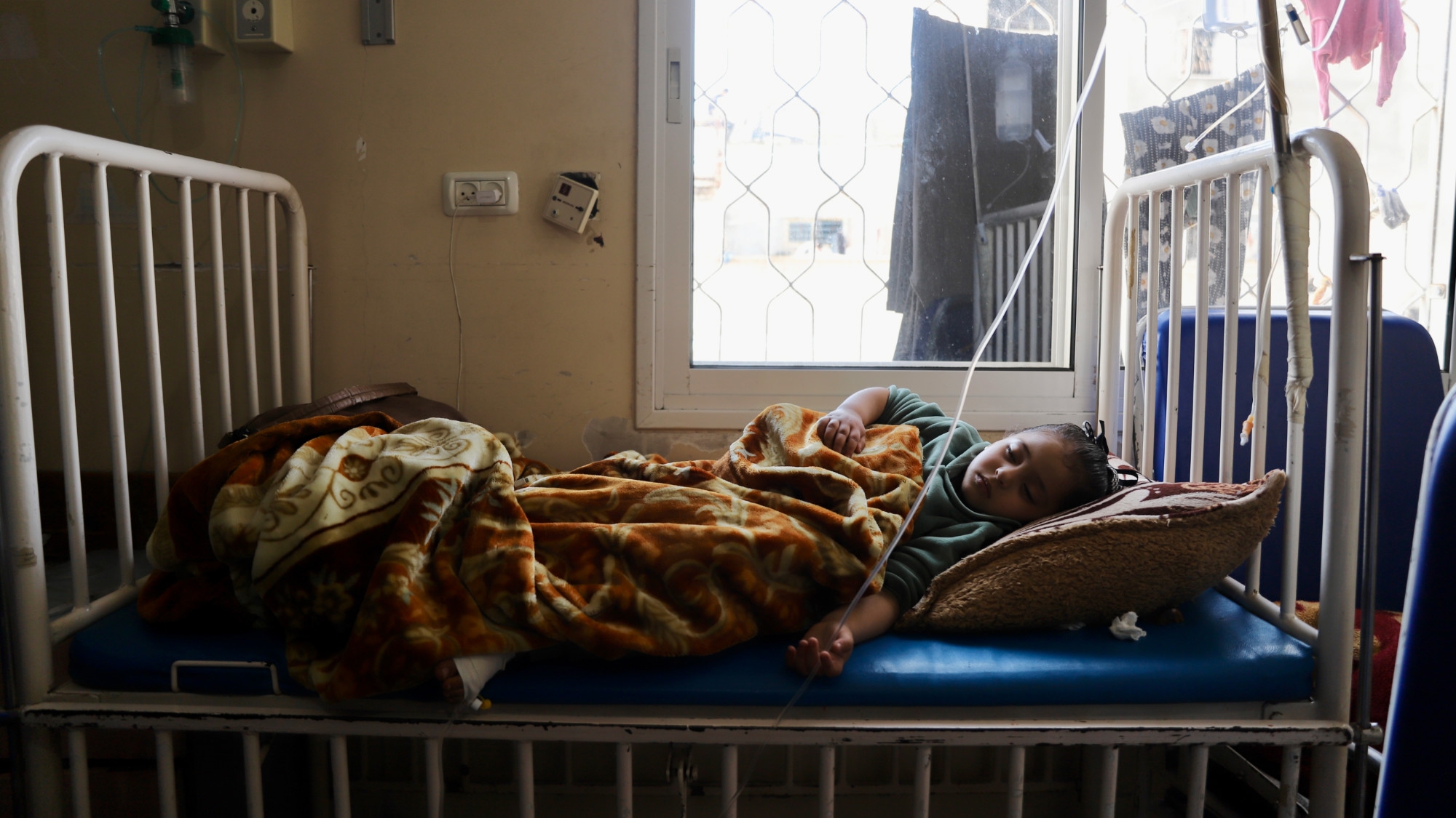 A malnourished child receiving treatment at Kamal Adwan hospital in northern Gaza on 6 March, 2024 (MEE/Mohammed al-Hajjar)