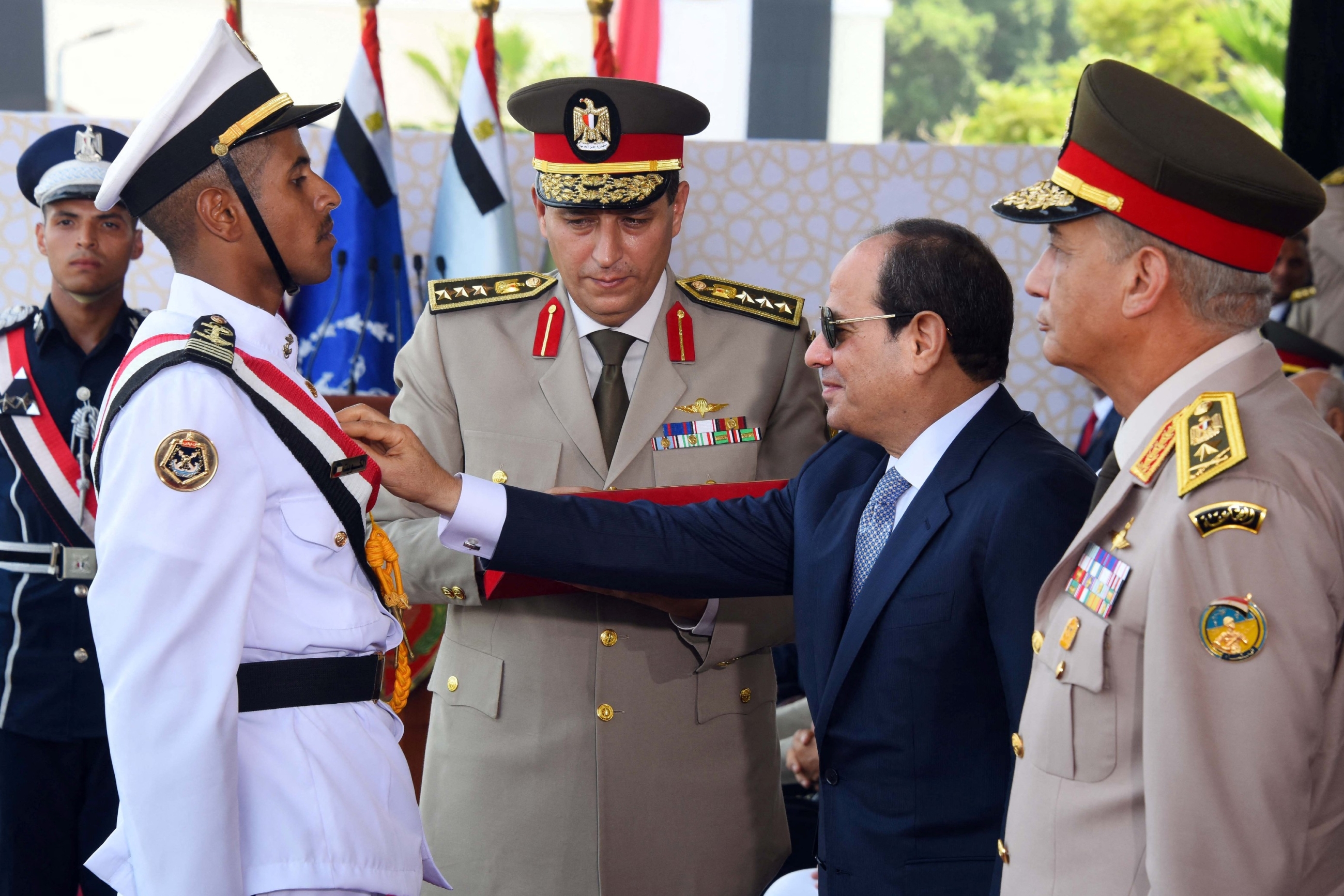 A handout picture released by the Egyptian Presidency on 22 July 2018 shows Egyptian President Abdel Fattah el-Sisi at the graduation ceremony of new officers at the army academy in the capital Cairo. (AFP)