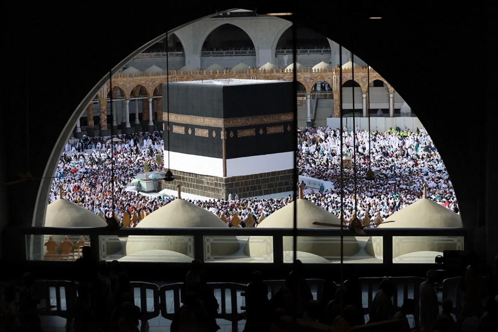Muslim worshippers around the Kaaba at the Grand Mosque in Saudi Arabia's holy city of Mecca on 5 July 2022. (AFP)