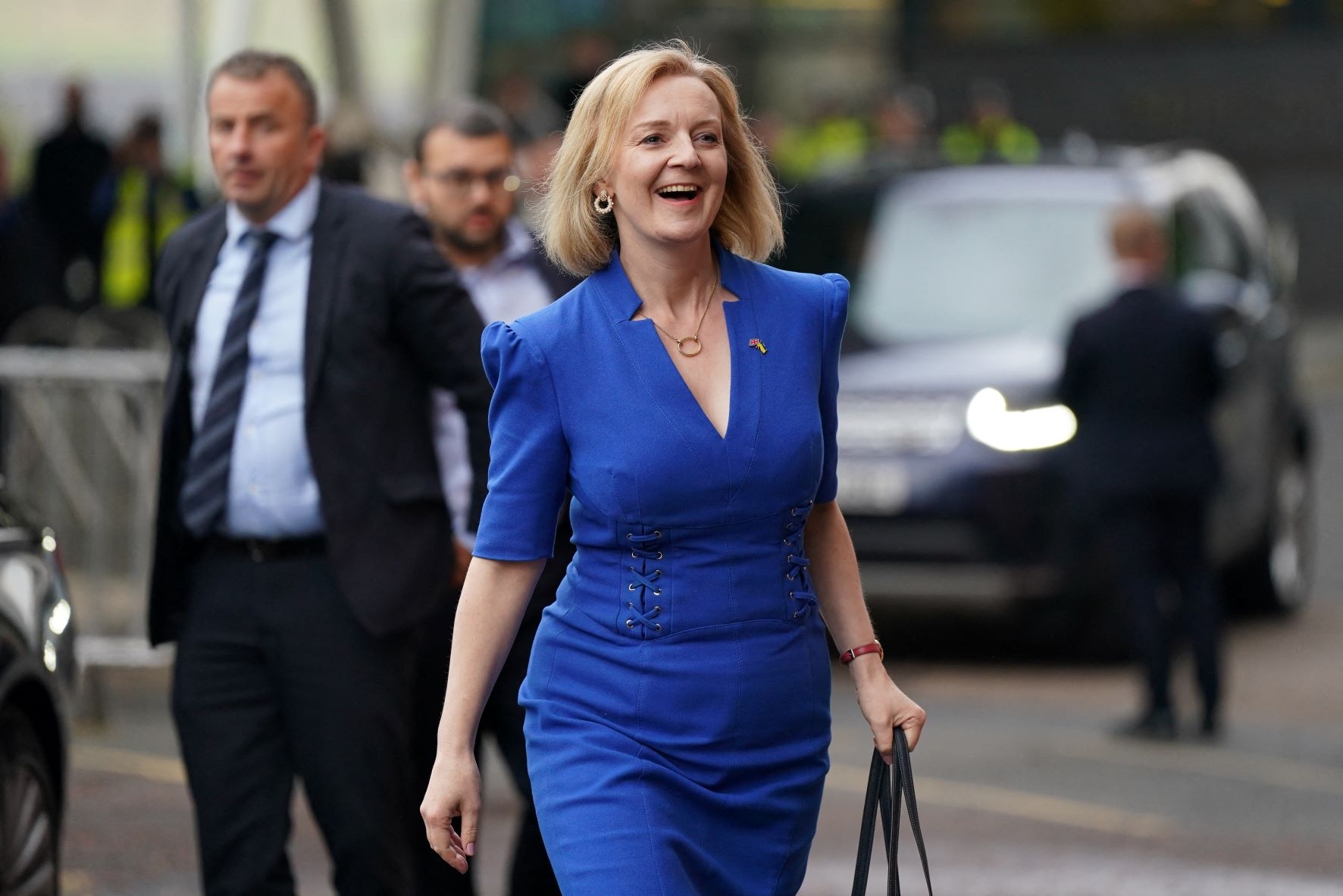 Liz Truss, Britain's Foreign Secretary and contender to become the country's next prime minister, arrives to appear on the BBC's 'The UK's Next Prime Minister: The Debate' in Victoria Hall in Stoke-on-Trent, central England, on July 25, 2022 (AFP)