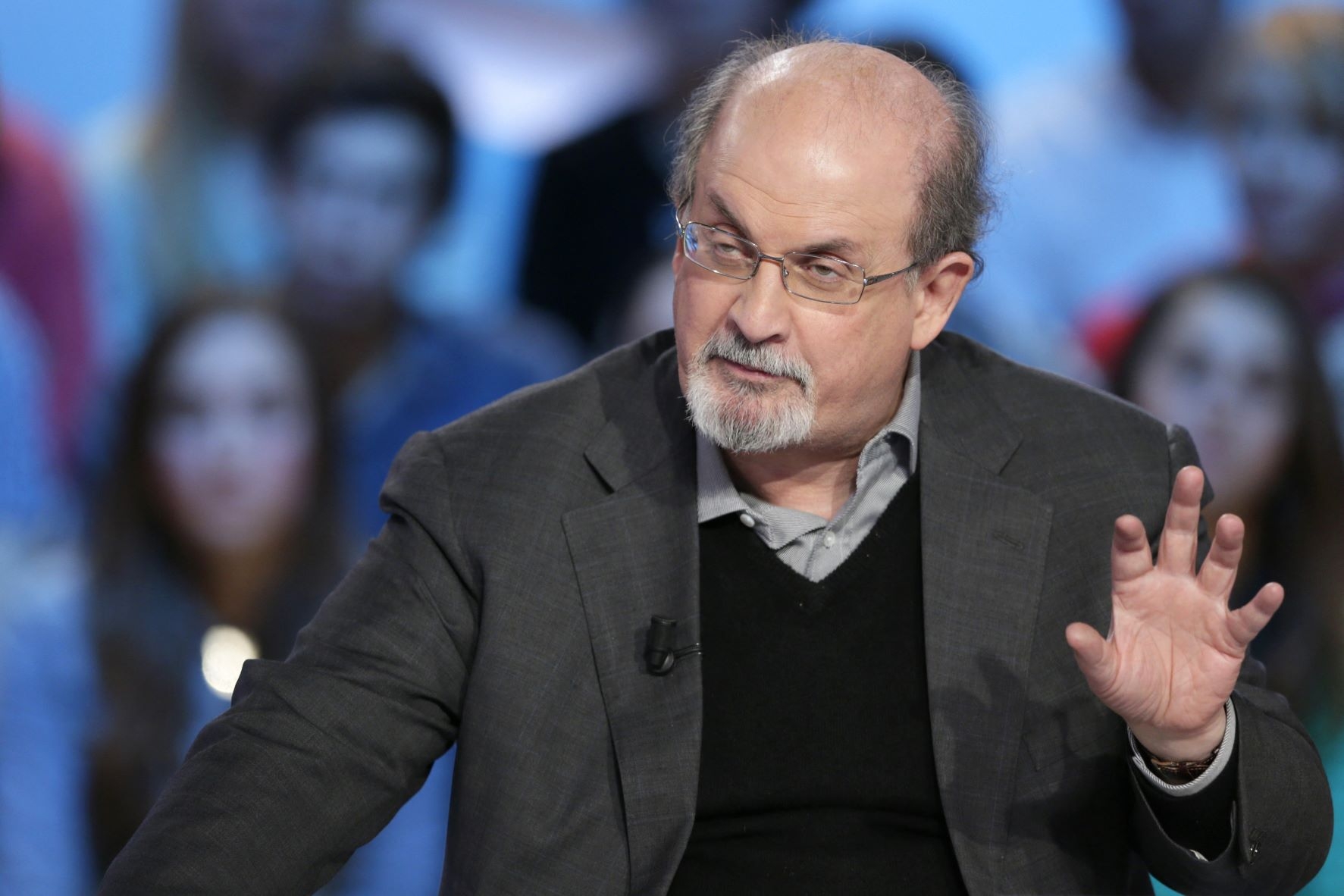 In this file photo taken on November 16, 2012, British author Salman Rushdie takes part in the TV show "Le grand journal" on a set of French TV Canal+ in Paris (AFP)