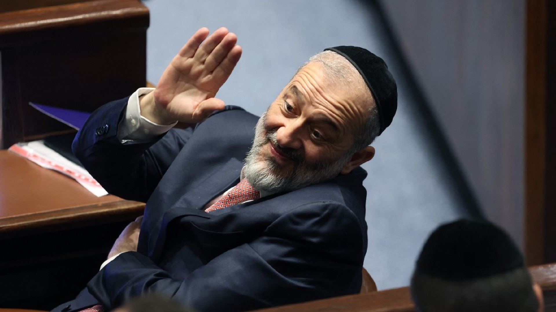 Shas party leader Arye Dery gestures at the Israeli parliament in Jerusalem, on 15 November 2022 (AFP)