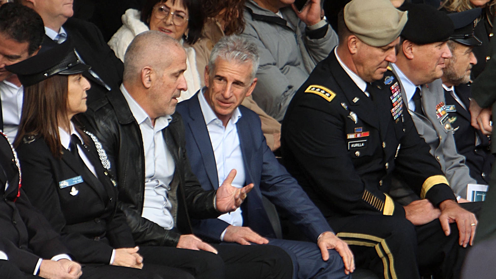 Israel’s Mossad chief David Barnea (C) attends a honour guard ceremony for Israel’s incoming military chief, at the Israeli Defence Ministry in Tel Aviv, on 16 January 2023 (AFP)