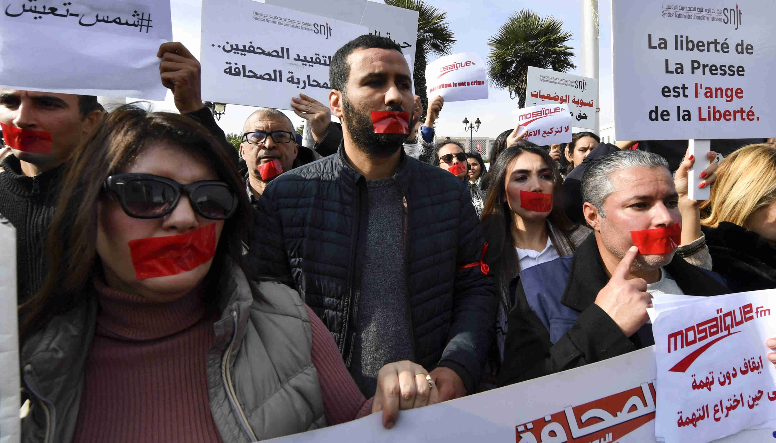 Tunisian journalists protest in defence of freedom of expression and against the persecution of journalists in Tunis on 16 February 2023 (AFP)