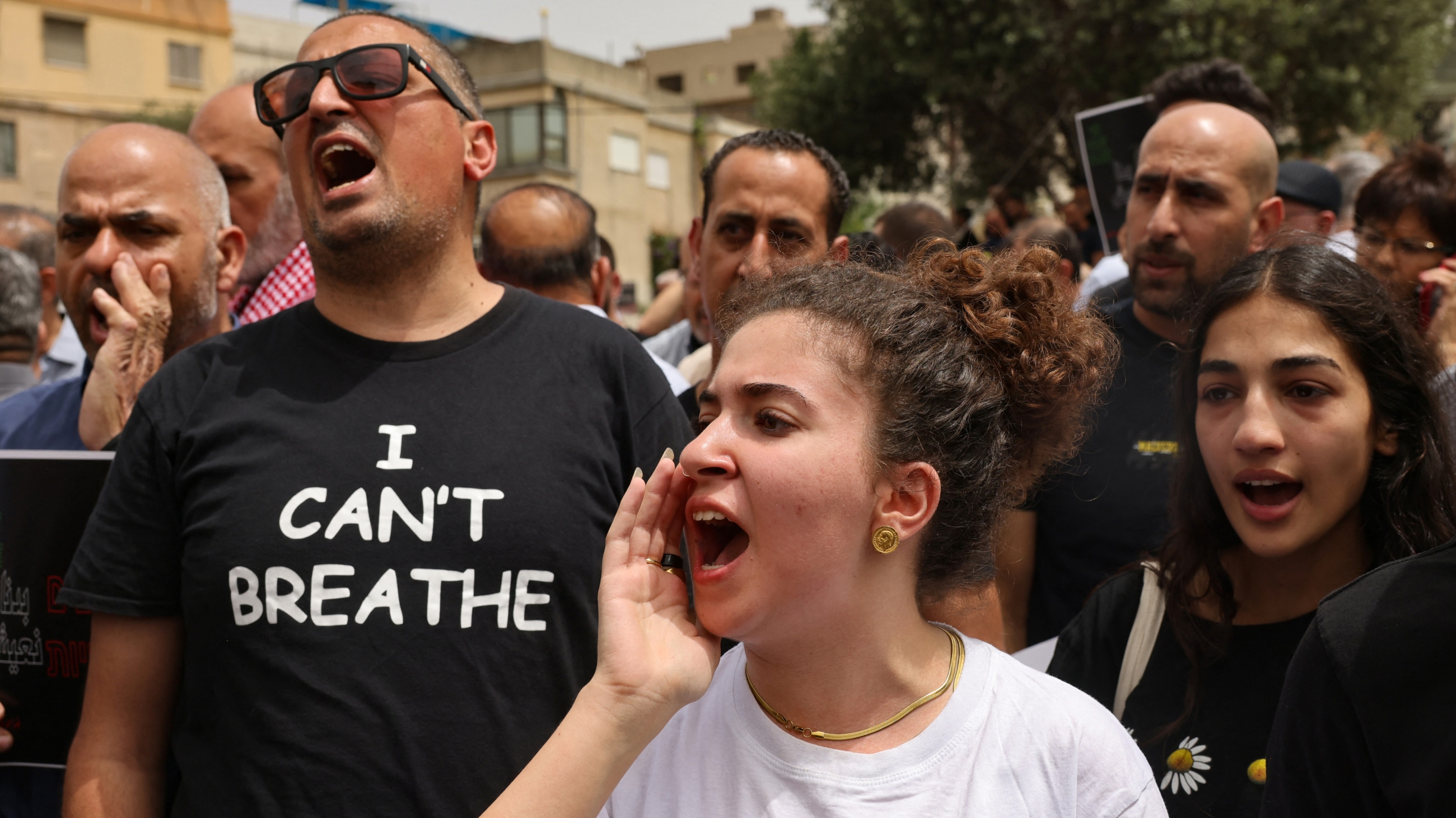 Demonstrators protest against the killing of five Palestinian citizens of Israel on 9 June 2023 (AFP)