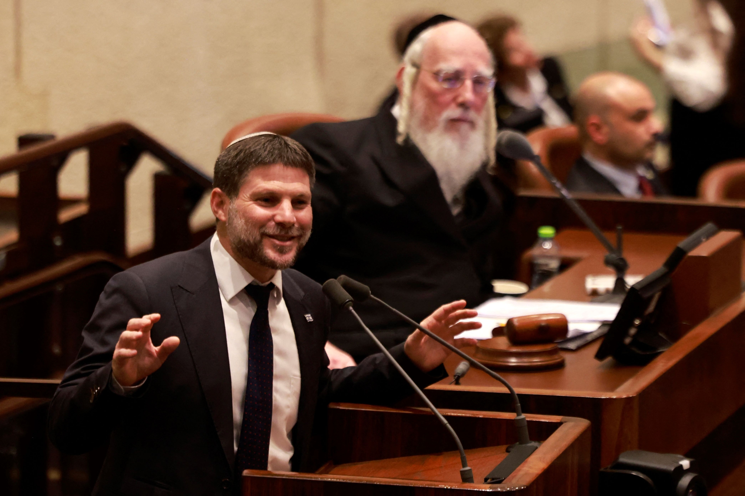 Israel's Finance minister Bezalel Smotrich speaks during a parliament (Knesset) meeting in Jerusalem on July 10, 2023 (AFP)