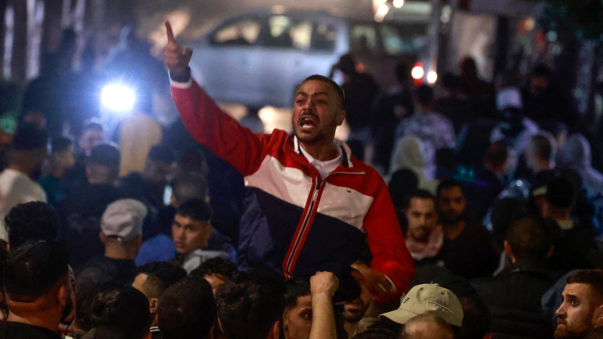 Palestinians rally in solidarity with the Palestinians of the Gaza Strip in the West Bank city of Ramallah, on 17 October 2023 (AFP)