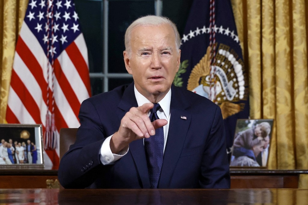 US President Joe Biden addresses the nation on the Israel-Palestine conflict from the Oval Office on 19 October 2023 (AFP)
