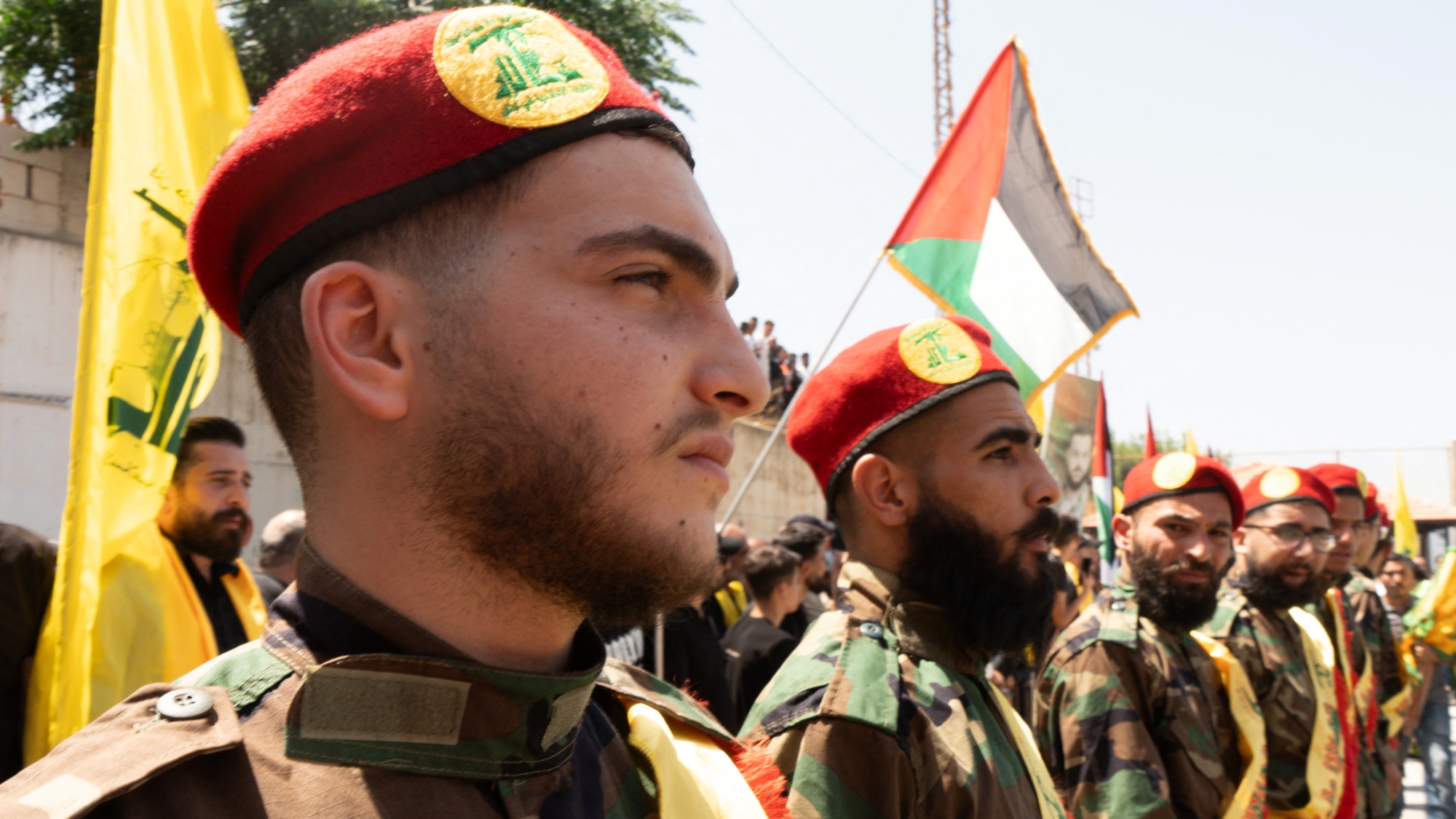 Commrades attend the funeral of killed Hezbollah fighter Wehbi Mohammed Ibrahim, in the village of Kfar Kila in southern Lebanon on 20 June 2024 (Hassan Fneich/AFP)