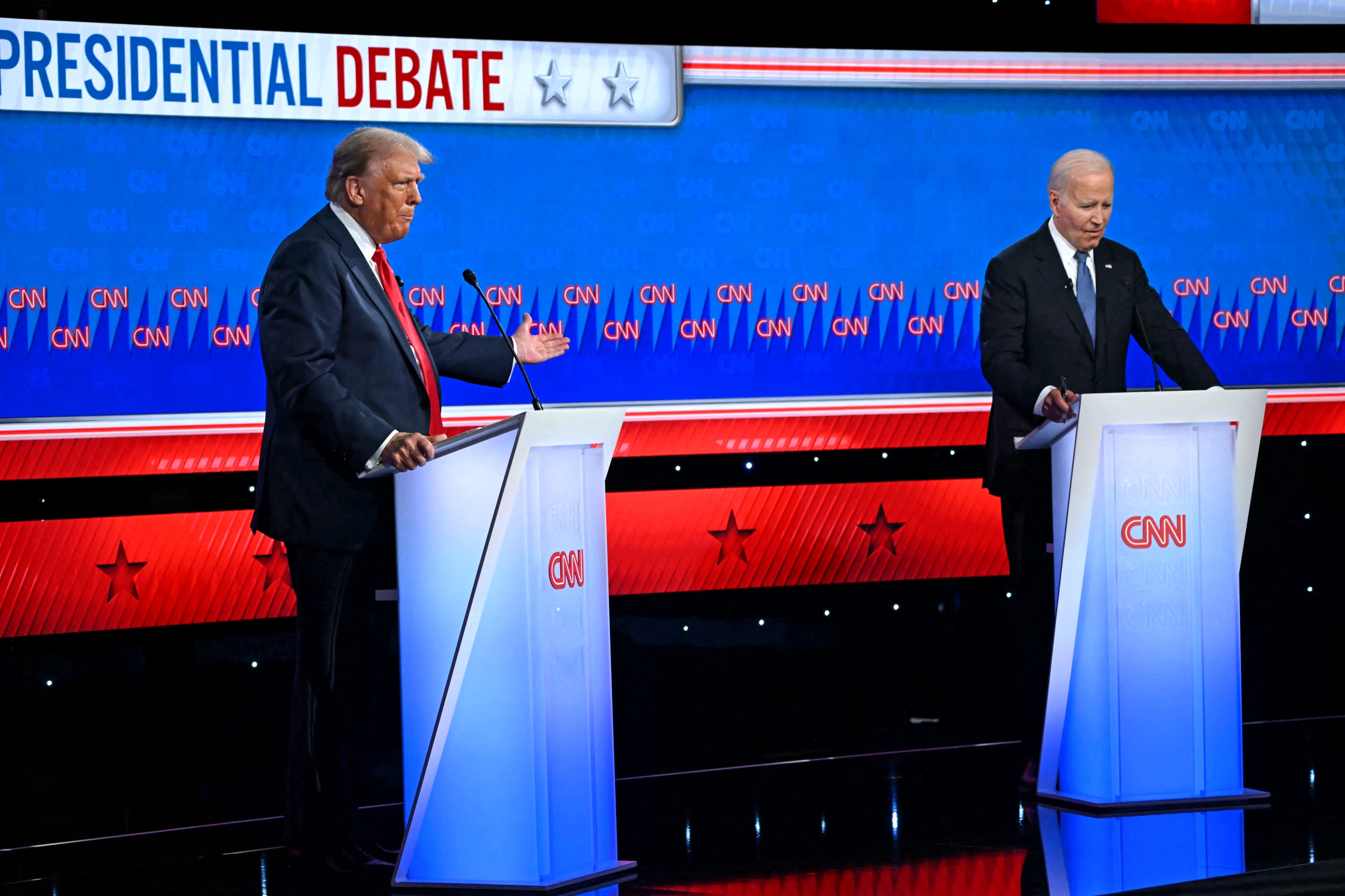 US President Joe Biden and former US President Donald Trump participate in the first presidential debate of the 2024 elections at CNN's studios in Atlanta (Andrew Caballero-Reynolds/AFP).