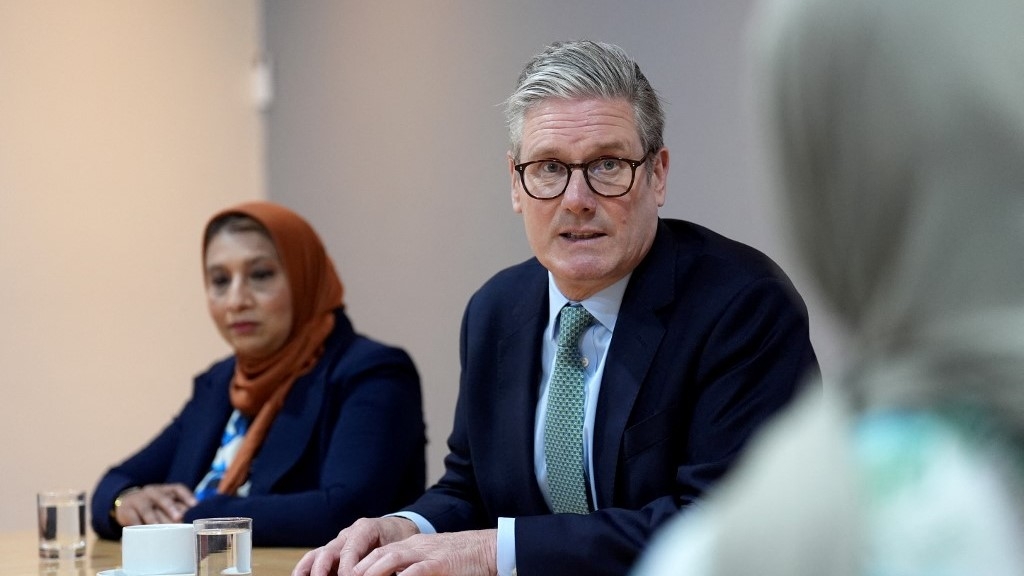 Britain's Prime Minister Keir Starmer addresses a meeting during a visit to The Hub - Solihull Mosque in Solihull, West Midlands, on 8 August (Joe Giddens/AFP)