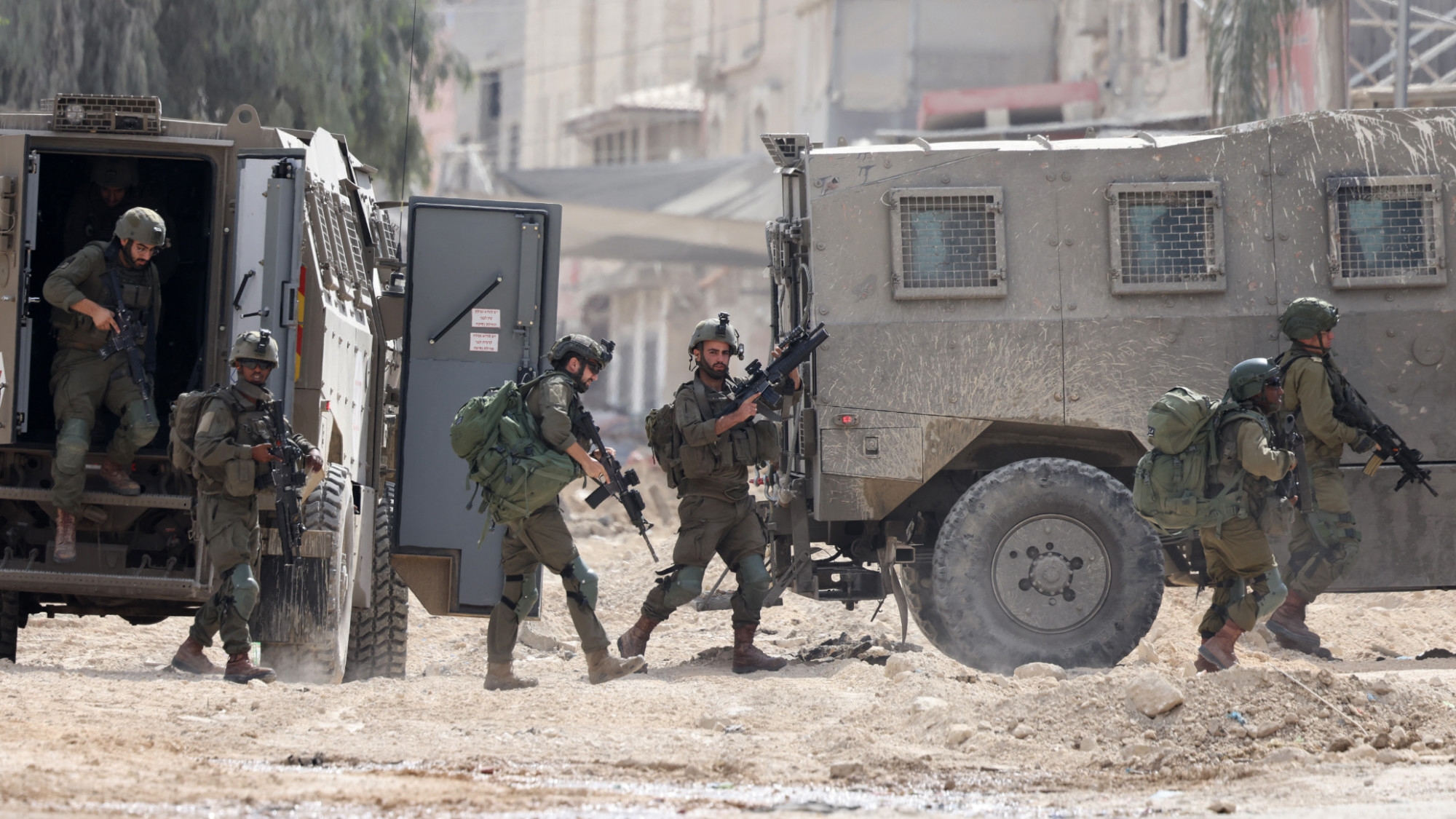 Israeli soldiers operate during a raid in the Nur Shams camp for Palestinian refugees near the city of Tulkarm in the occupied West Bank on 28 August 2024 (Jaafar Ashtiyeh/AFP)