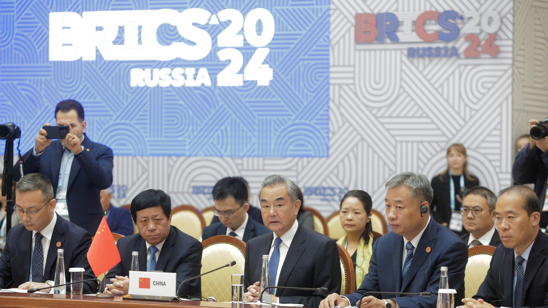 Chinese Foreign Minister Wang Yi, centre, attends a meeting of Brics high-ranking officials responsible for security matters in Saint Petersburg, on 11 September 2024 (Irina Motina/AFP)