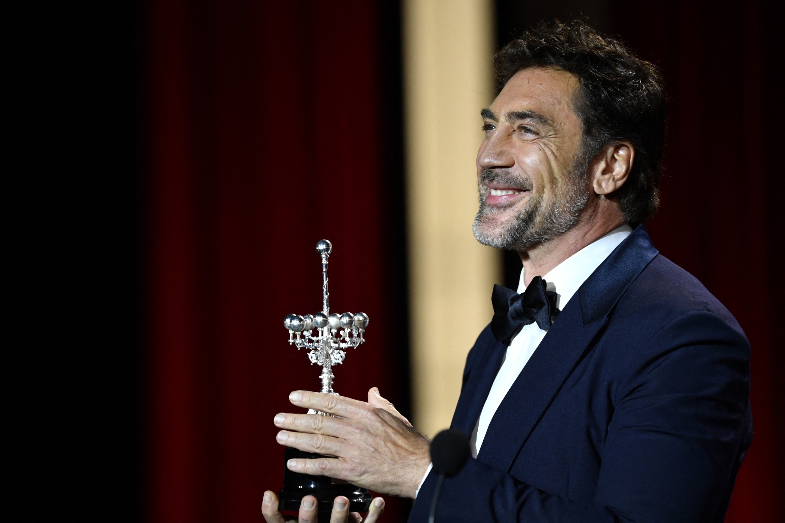 Spanish actor Javier Bardem reacts to receiving the Donostia Lifetime Achievement Award at the 72nd San Sebastian International Film Festival in the northern Basque city of San Sebastian in Spain on 20 September 2024. 