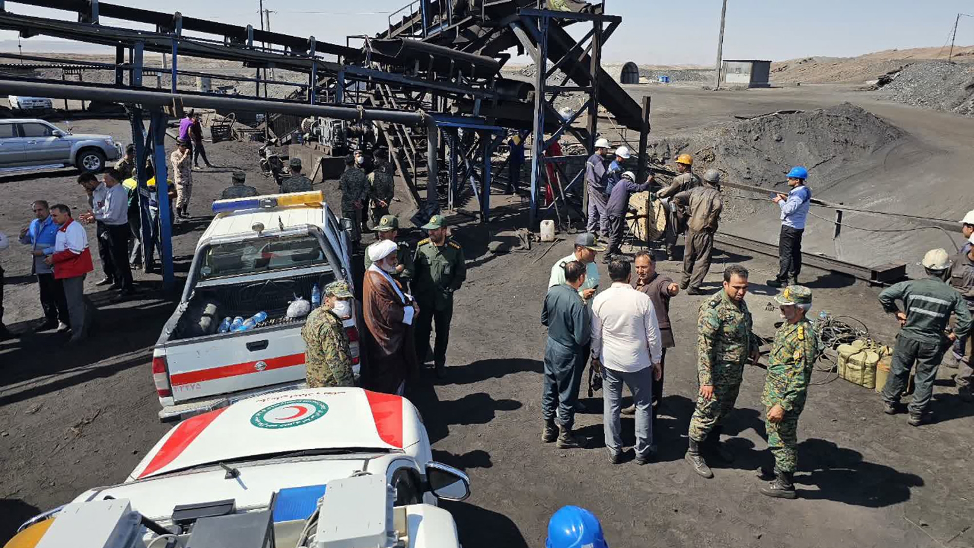 Security forces at the scene of a blast at a coal mine in Tabas in Iran's Khorasan province on 22 September 2024 (Iranian Red Crescent via AFP)