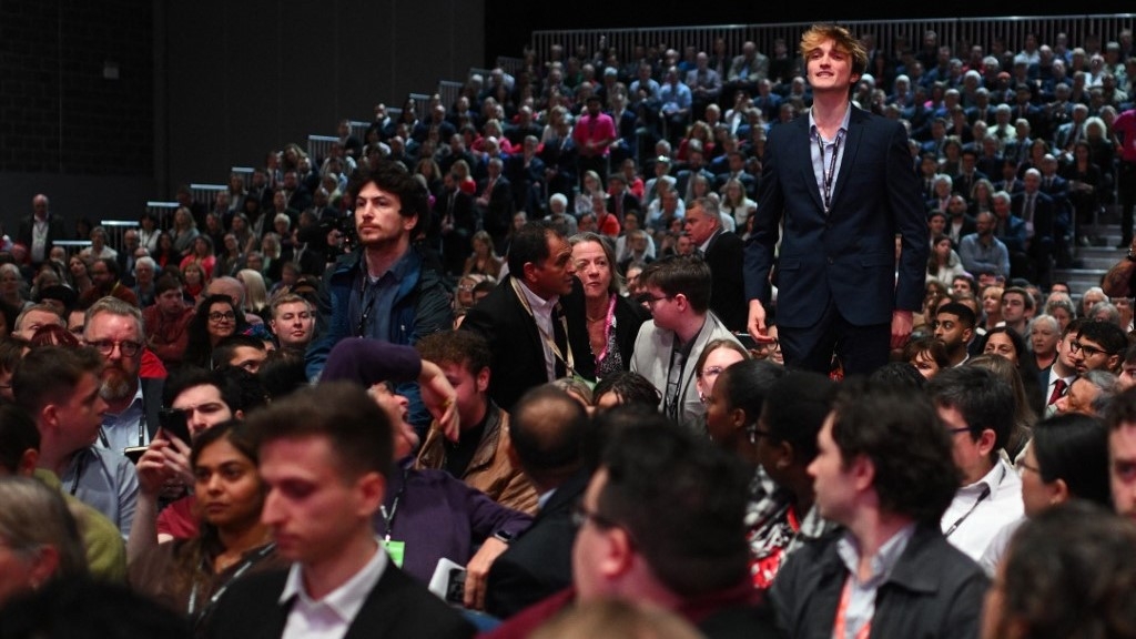 Protesters interrupt Britain's Chancellor of the Exchequer Rachel Reeves making her speech on the second day of the annual Labour Party conference in Liverpool, north-west England, on September 23