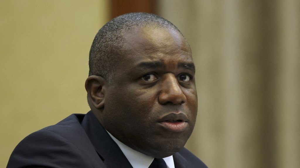 Britain's Foreign Secretary David Lammy attends a meeting with Chinese Vice Premier Ding Xuexiang (not pictured) at the Great Hall of the People in Beijing on 18 October (AFP/Florence Lo)