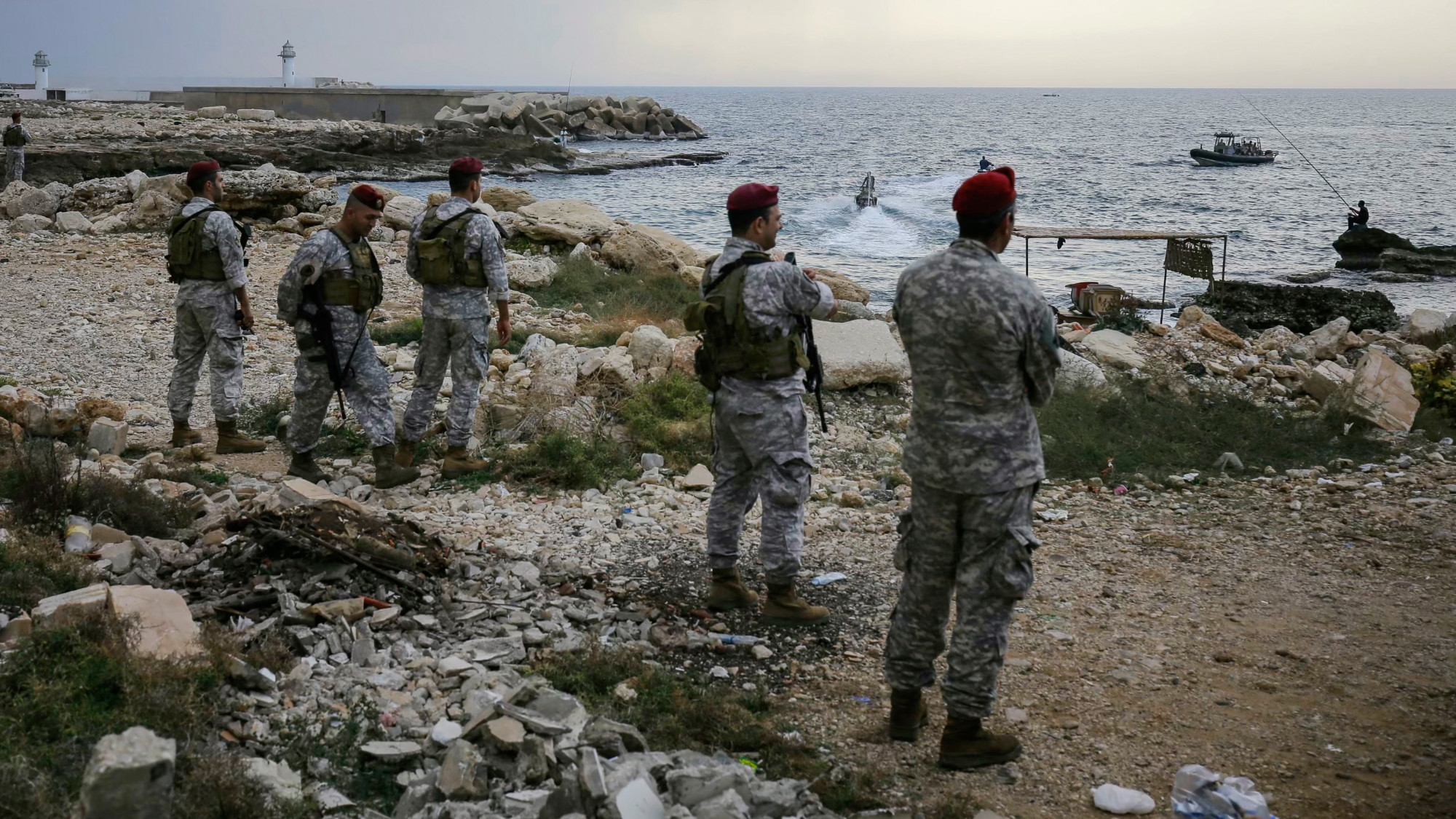 Lebanese soldiers inspect the beach at a reported landing site for a “naval commando force” that reportedly abducted a mariner in the northern coastal town of Batroun on 2 November 2024 (AFP/Ibrahim Chalhoub)