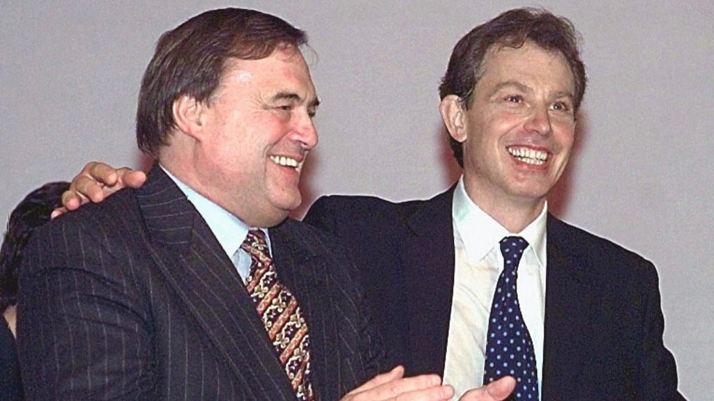 British Prime Minister Tony Blair (R) is congratulated September 30, 1997 by Deputy Prime Minister John Prescott (L) after he delivered his first speech as leader of the new Labour government (Johnny Eggitt/ AFP)