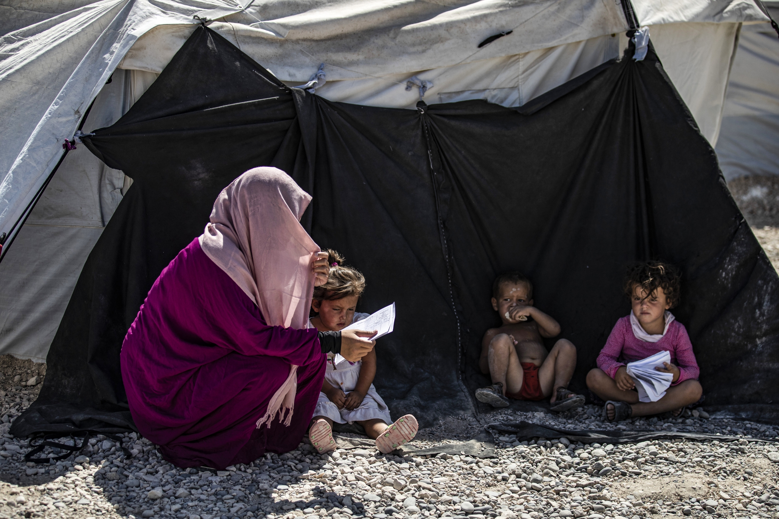 Woman and children in Camp Roj