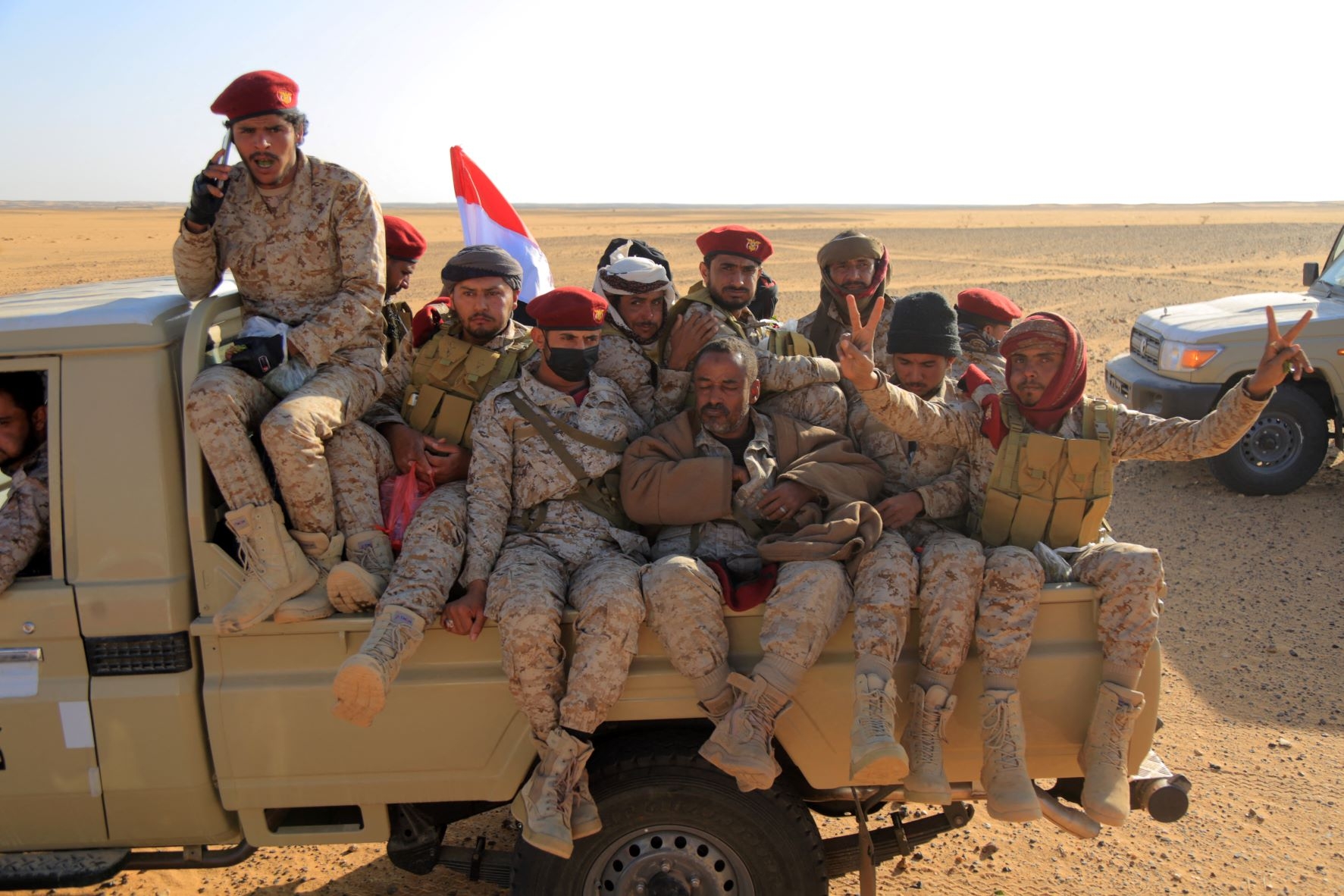 Yemeni army reinforcements arrive to join fighters loyal to Yemen's Saudi-backed government, on the southern front of Marib on 16 November 2021 (AFP)