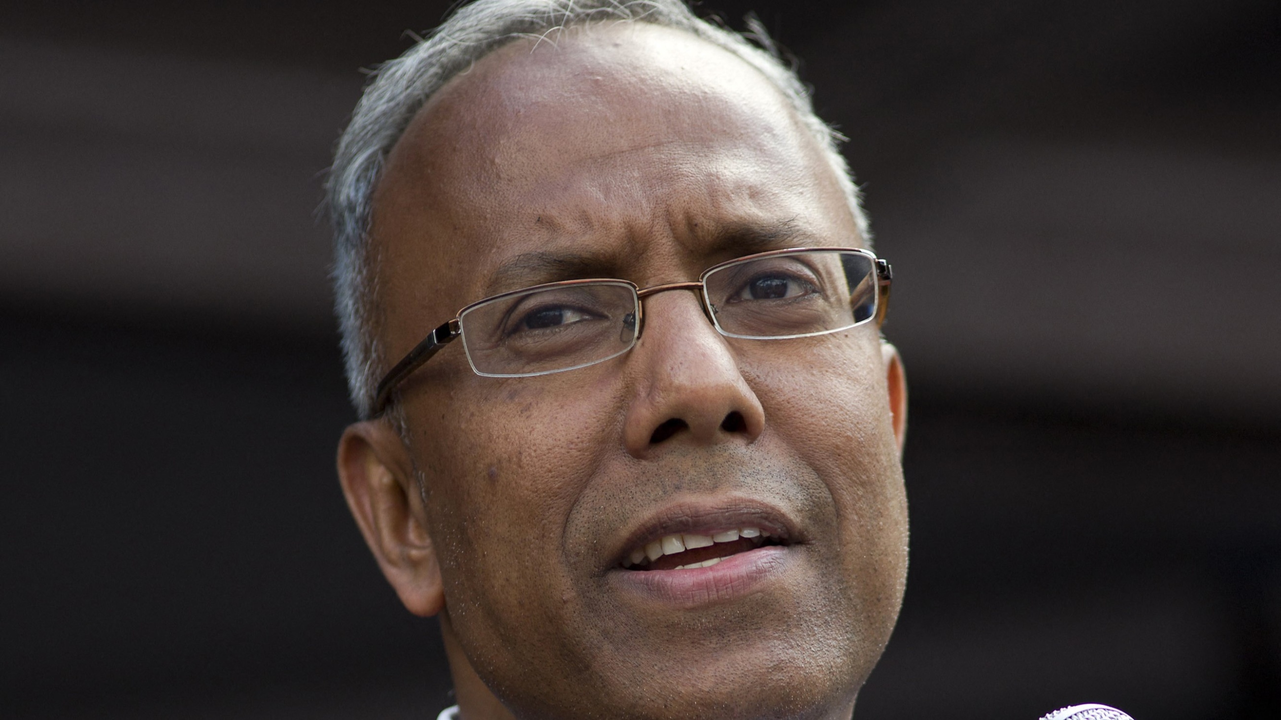 Lutfur Rahman, Labour Party mayor of Tower Hamlets, addresses an anti-austerity rally in Parliament Square in London on June 21, 2014.