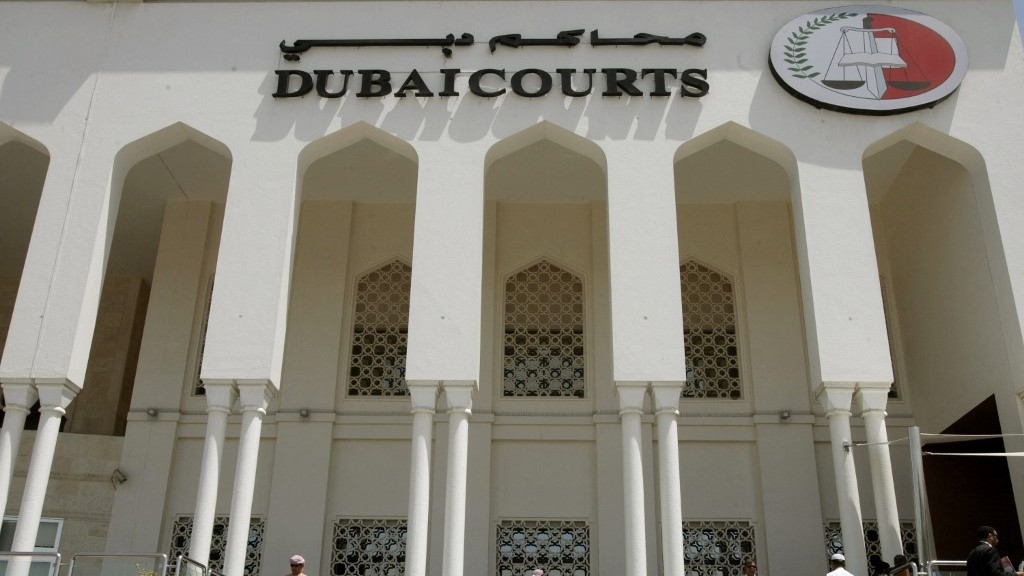 A closeup shot shows the facade of the Dubai Courts building during a hearing on 4 April 2010.