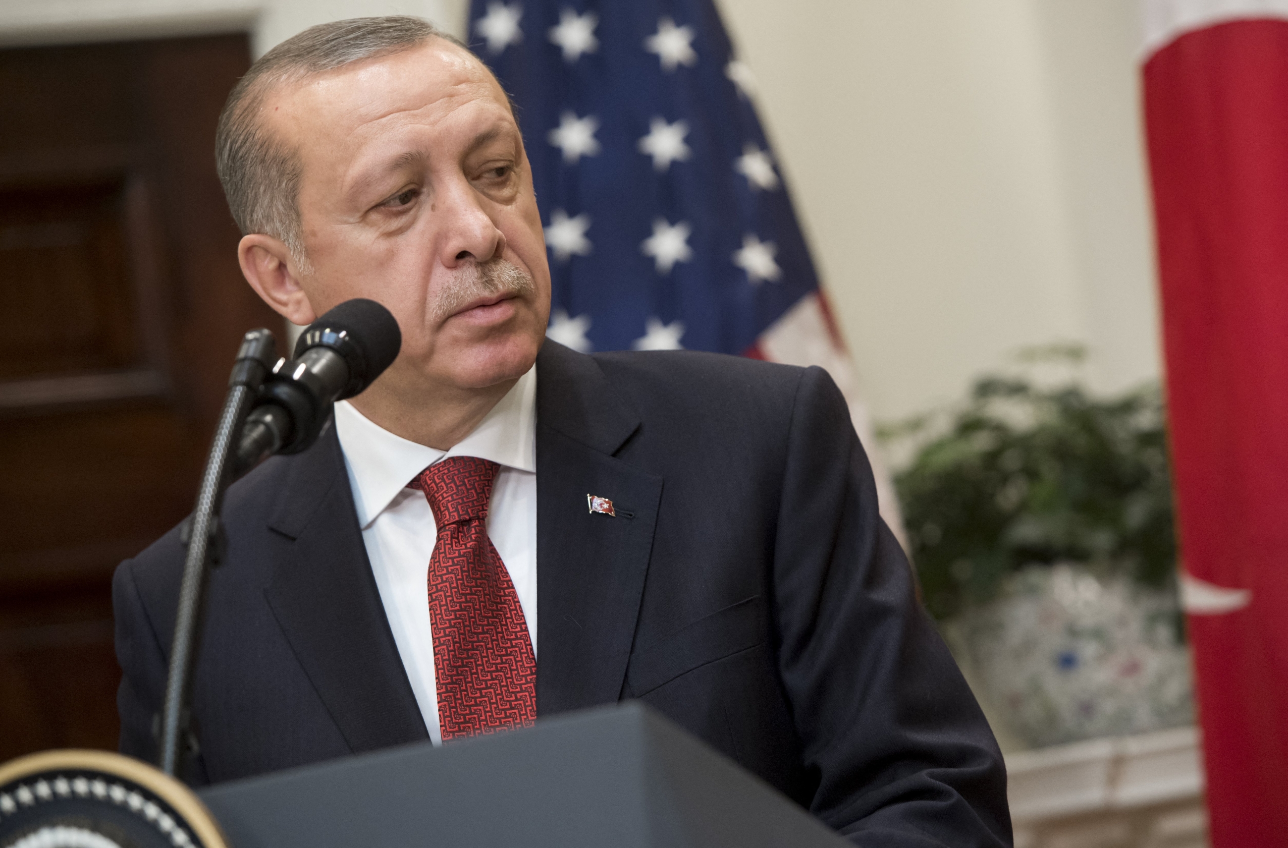 Turkish President Recep Tayyip Erdogan speaks to the press in the Roosevelt Room of the White House in Washington on 16 May 2017 (Saul Loeb/AFP)