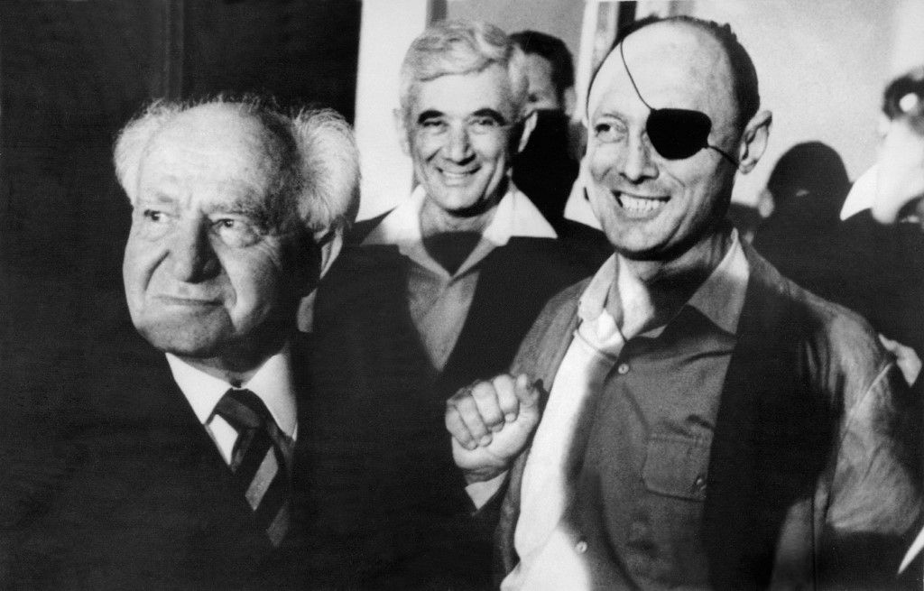 Former Israeli Prime Minister David Ben-Gurion (left) accompanied by Israeli defence minister General Moshe Dayan (right)