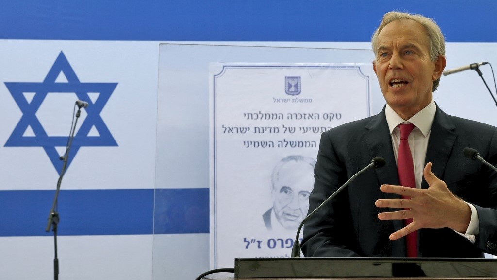 Former British prime minister Tony Blair speaks during a ceremony marking one year since the death of the late Israeli President Shimon Peres on September 14, 2017 at the Mt. Herzel cemetery in Jerusalem (Gali Tibbon / AFP)