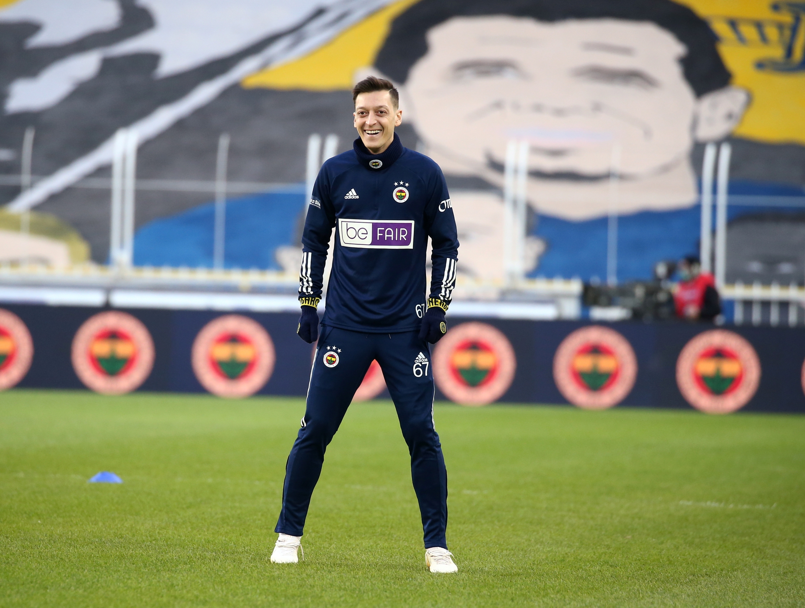 Mesut Ozil wears a "BeFair" training jersey on 21 February, as part of Fenerbahce's campaign against the broadcaster BeIN Sports (Reuters)