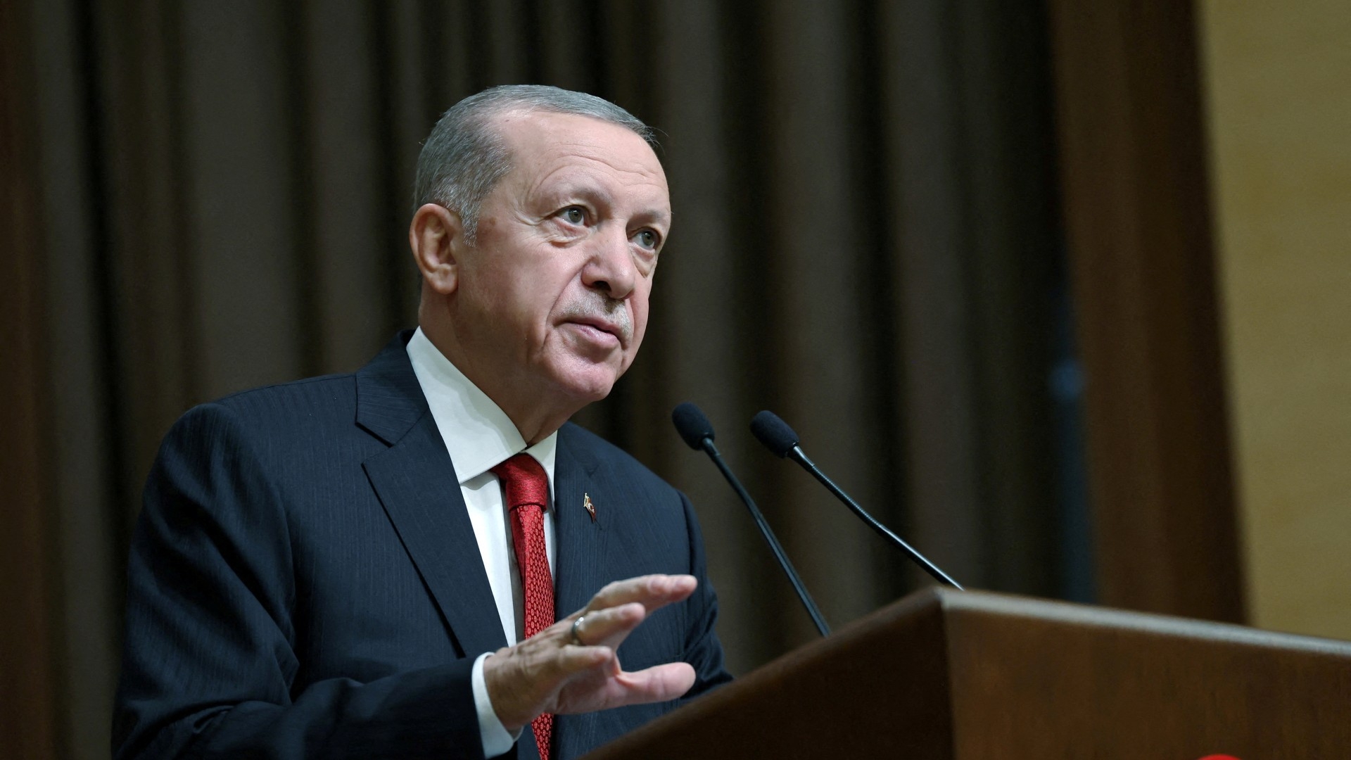Turkey's President Recep Tayyip Erdogan presents medium-term economic programme forecasts in Ankara, 6 September (Reuters)