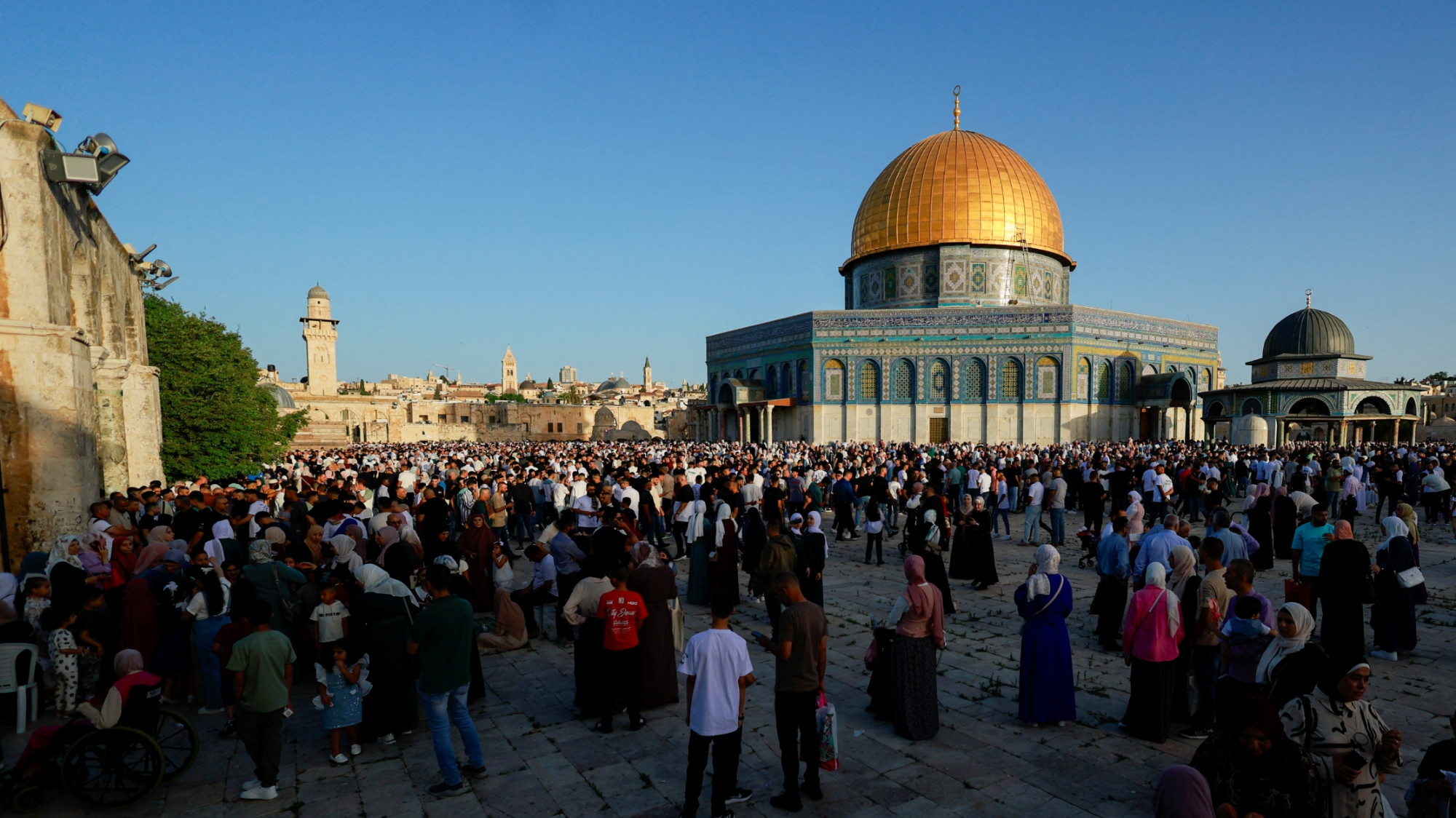 Palestinians gather on the first day of the Muslim holiday of Eid al-Adha at the Al-Aqsa Mosque in Jerusalem's Old City, 16 June 2024 (Reuters/Ammar Awad)