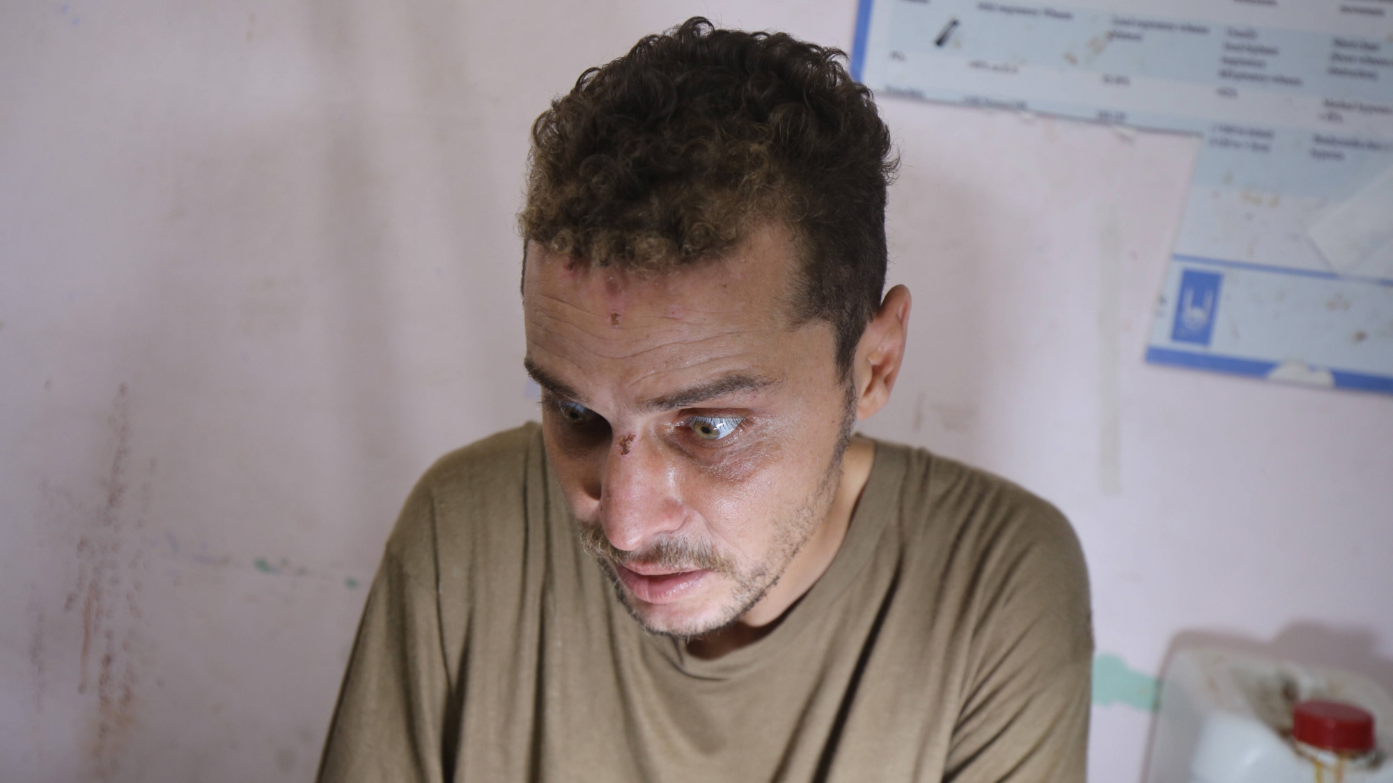 A Palestinian detainee in shock after his release by the Israeli army Gaza's Deir al-Balah on 20 June 2024 (IMAGO/APAimages via Reuters)