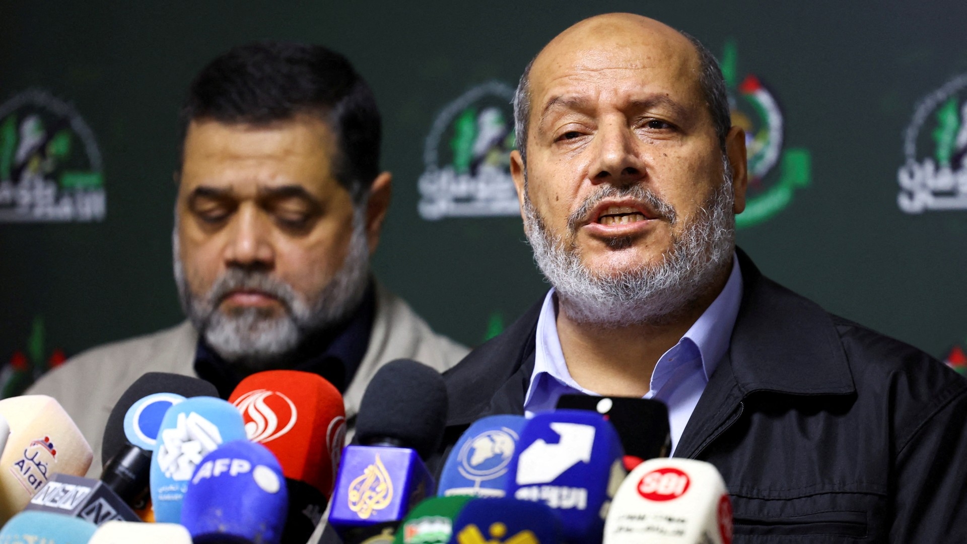 Hamas officials Khalil al-Hayya and Osama Hamdan attend a press conference in Beirut, Lebanon 21 November 2023 (Esa Alexander/Reuters)