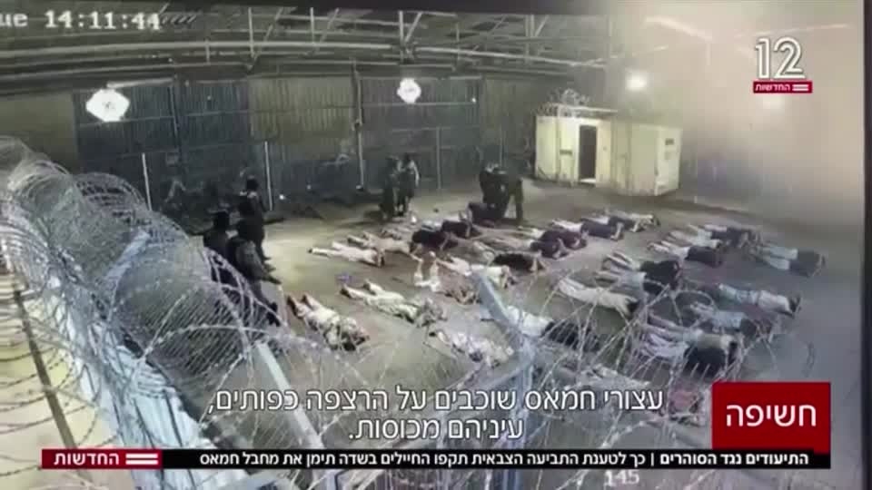 Israeli Channel 12 releases a video showing soldiers allegedly sexually abusing a Palestinian prisoner at Sde Teiman prison, just north of Gaza, on 7 August 2024 (Reuters)