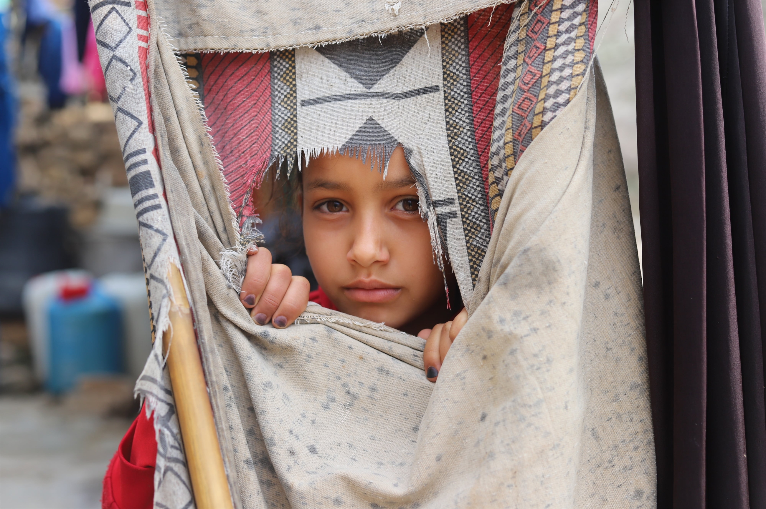Yemen-girl-displaced-camp-Razih-Saada-2021-reuters