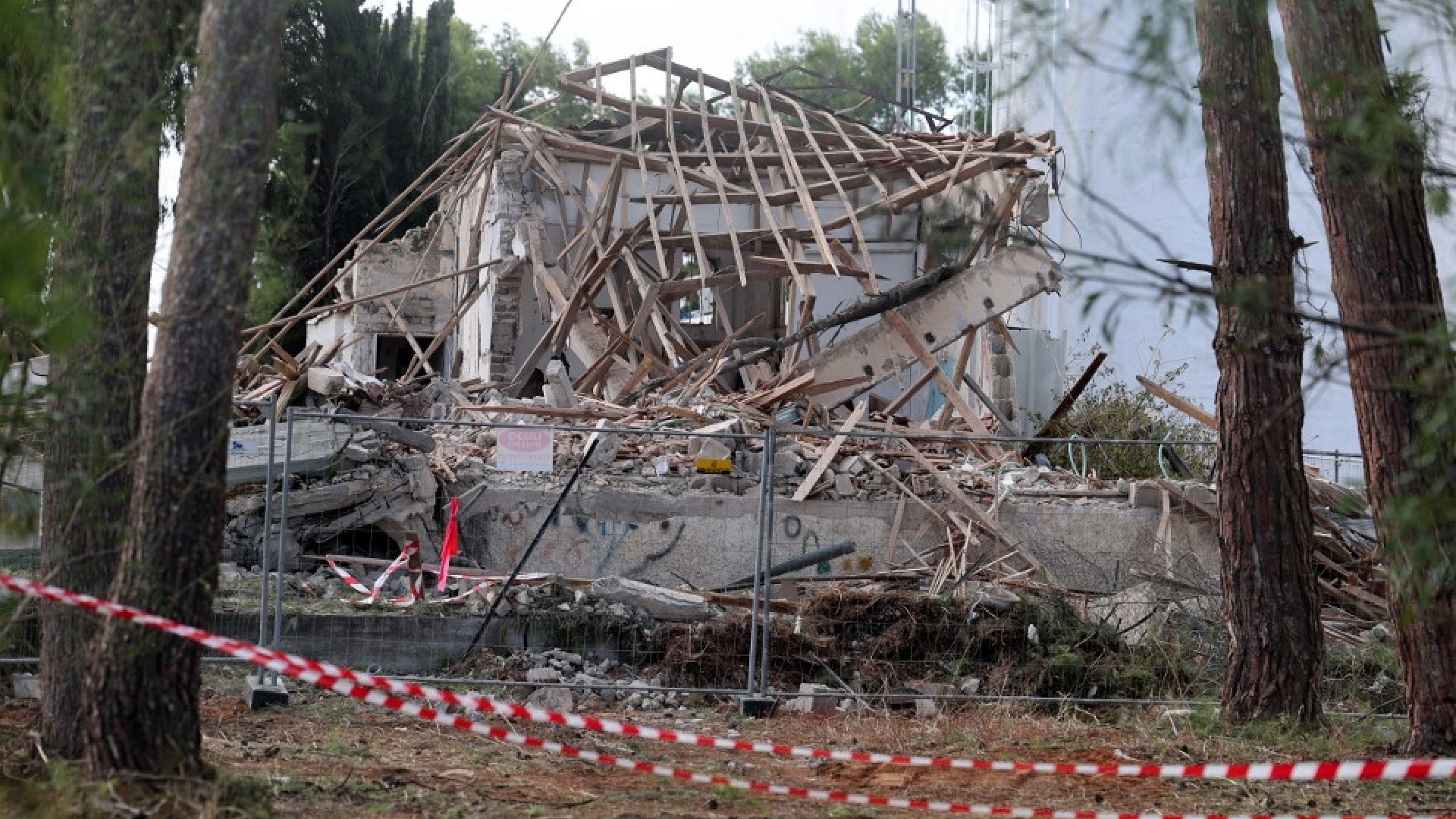 A destroyed building is pictured in Hod HaSharon in the aftermath of an Iranian missile attack on Israel, on 2 October 2024 (AFP)