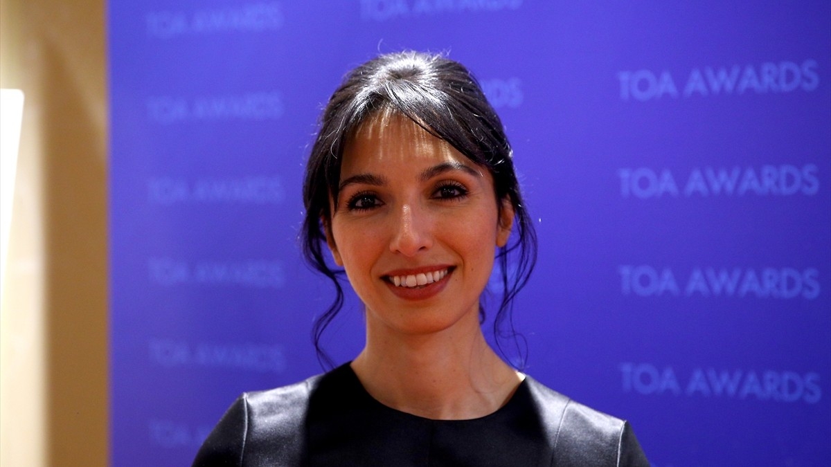 Hafize Gaye Erkan poses for a photo after receiving an award at the ceremony of the "40 Most Influential Young People Under 40" awards in New York in 2017 (Anadolu Agency)