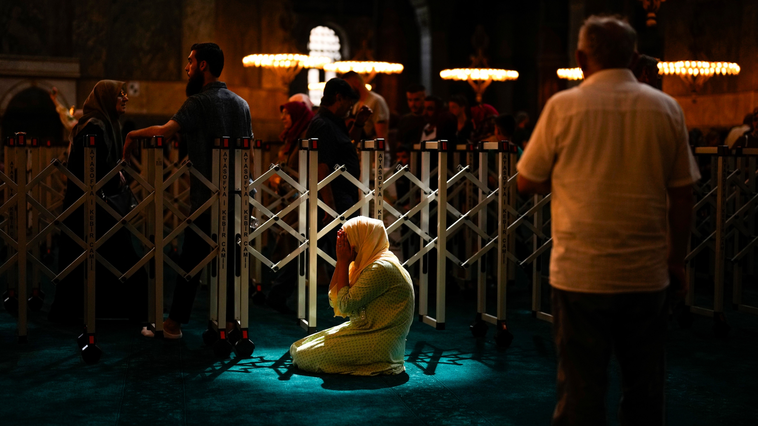 A Muslim worshipper prays at the Hagia Sophia mosque in Istanbul, Turkey, on 5 July 2023 (AP)