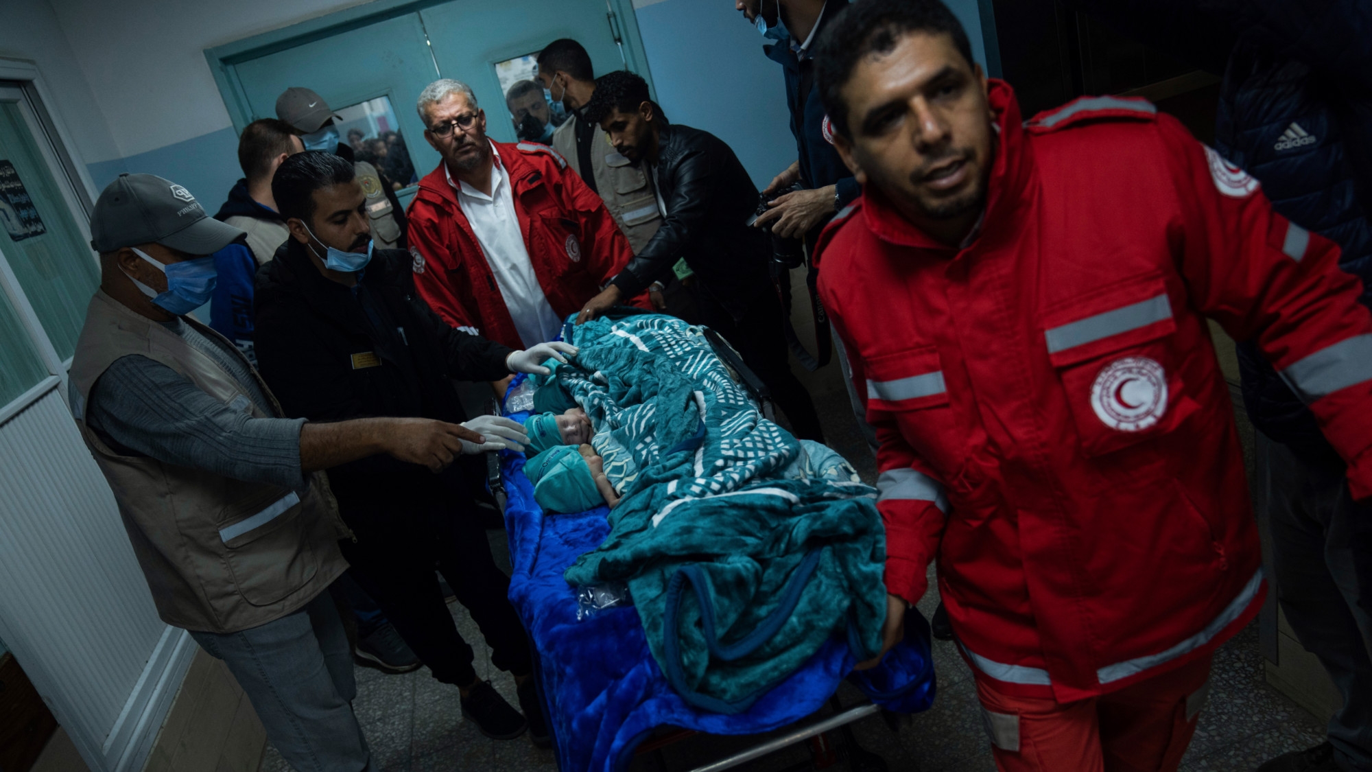 Medics prepare premature babies for transport to Egypt after they were evacuated from Shifa Hospital in Gaza City to a hospital in Rafah on 20 Monday 2023 (AP) 