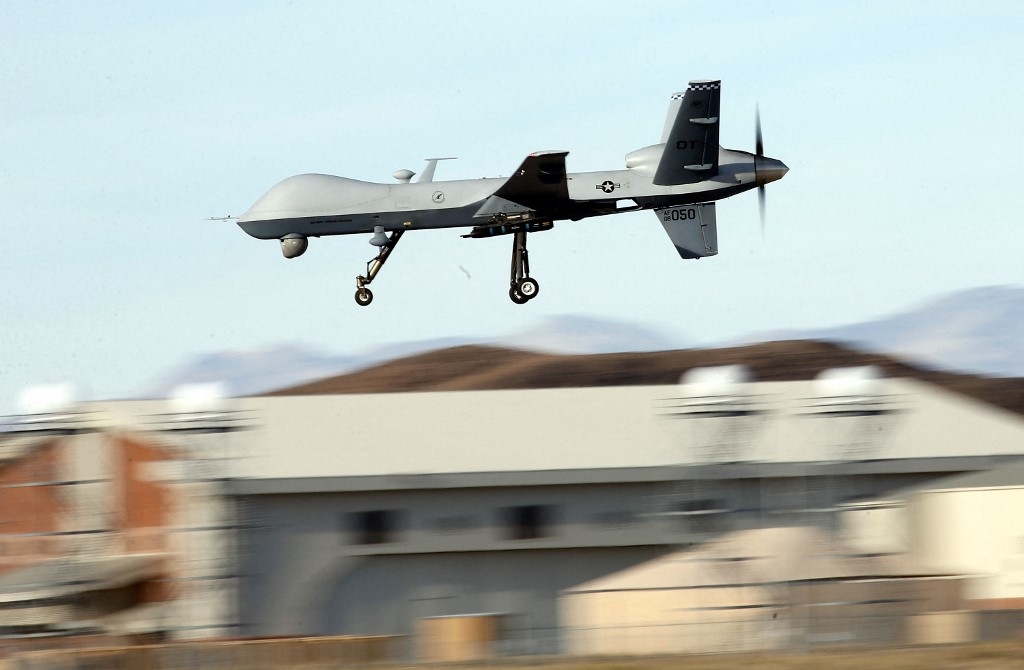 An MQ-9 Reaper remotely piloted aircraft (RPA) flies by during a training mission at Creech Air Force Base on November 17, 2015 in Indian Springs, Nevada