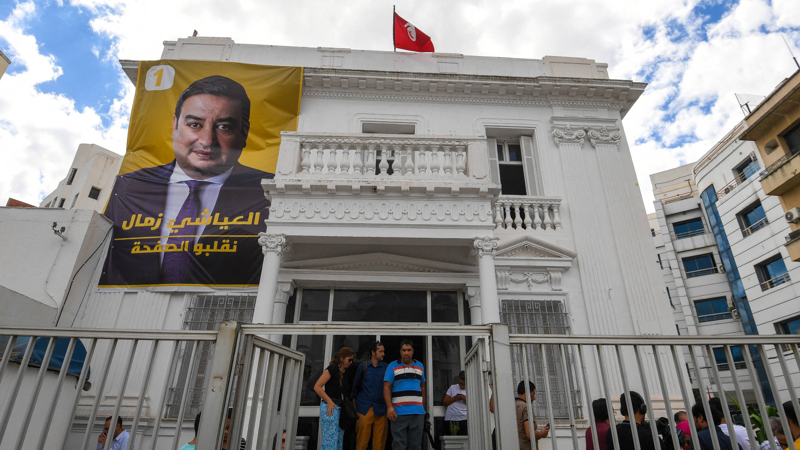 A poster of imprisoned presidential candidate Ayachi Zammel is displayed at the entrance of his electoral headquarters in Tunis on 16 September 20204 (Fethi Belaid/AFP)