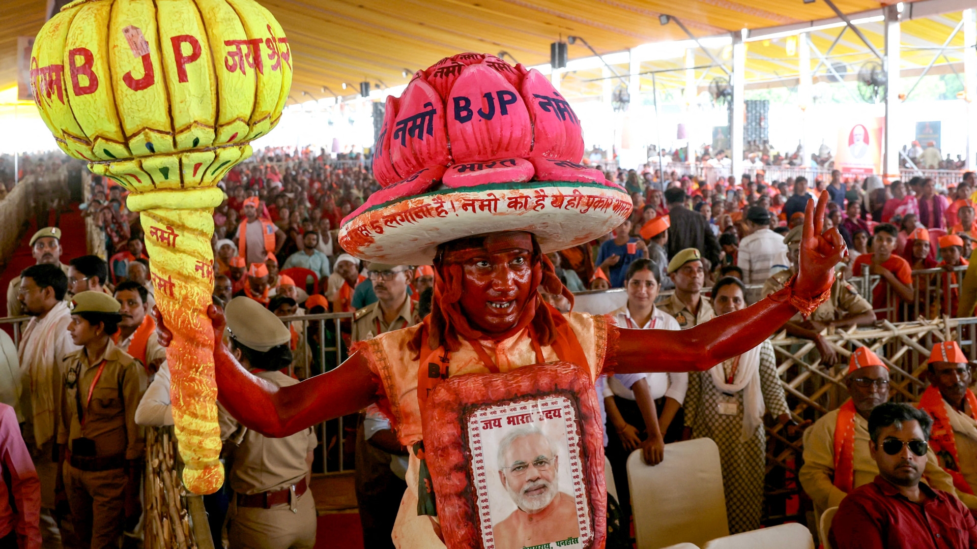 A supporter cheers during an address by Narendra Modi, India’s prime minister and leader of the Bharatiya Janata Party (BJP), on the outskirts of Varanasi on 18 June 2024 (Niharika Kulkarni/AFP)