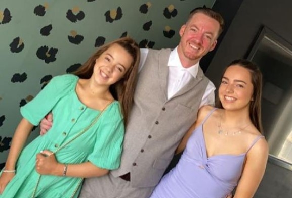 A photo of Brian Glendinning with his daughters Heidi and Lexi (supplied)