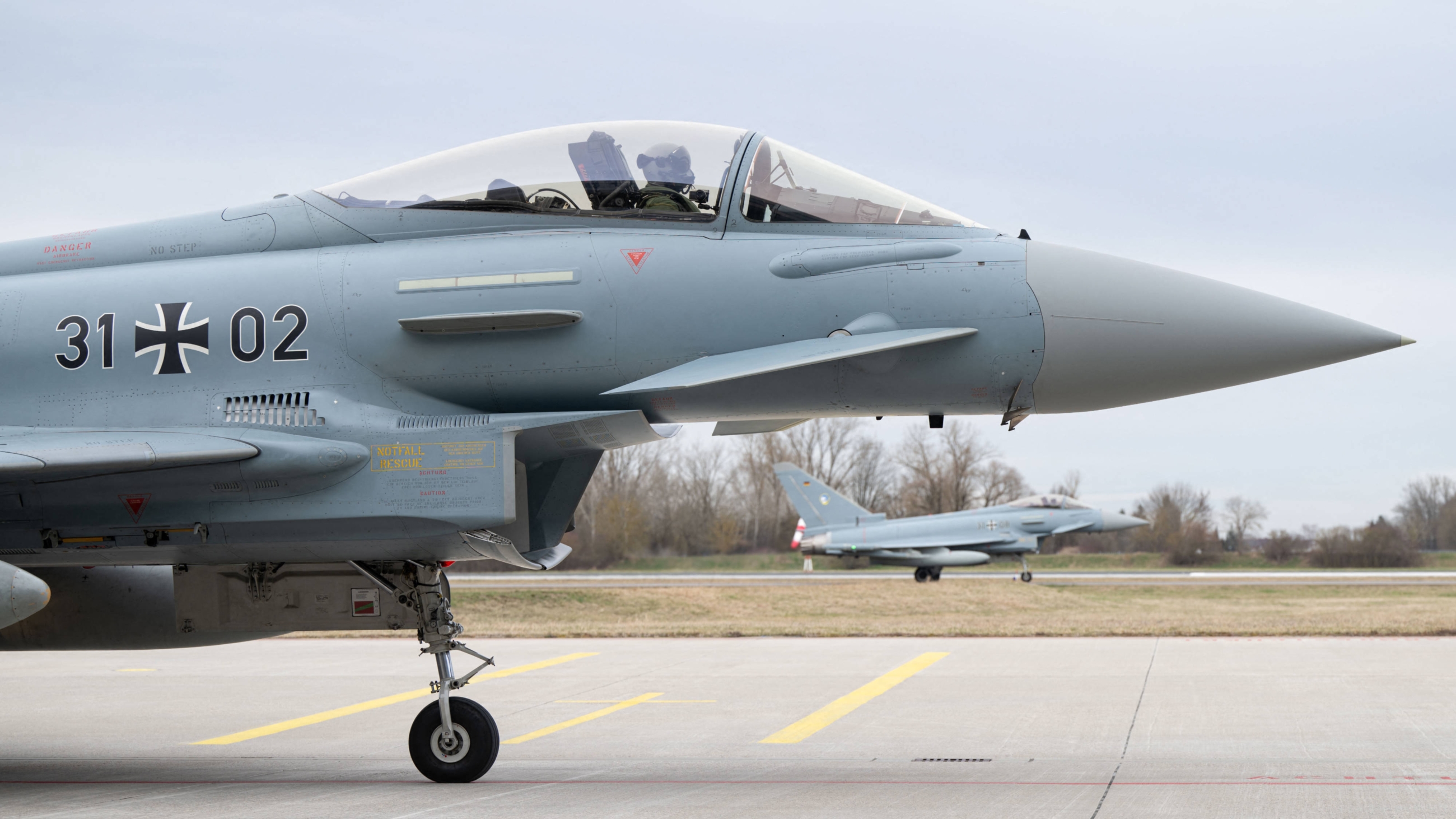 Two Eurofighter jets of the German Armed Forces at an airbase in Neuburg an der Donau, southern Germany, 26 February 2024 (AFP)